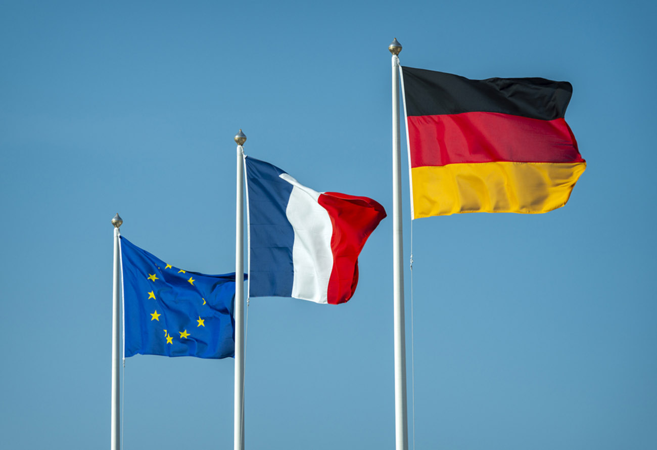 Eu-flag, French flag and German flag fluttering in the wind