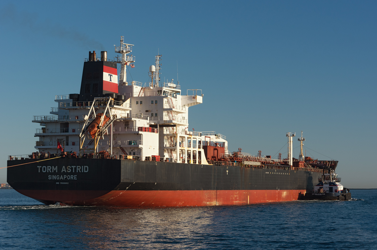 Port of Los Angeles, California, USA - November 27, 2021: image of oil and chemicals tanker Torm Astrid shown departing.
