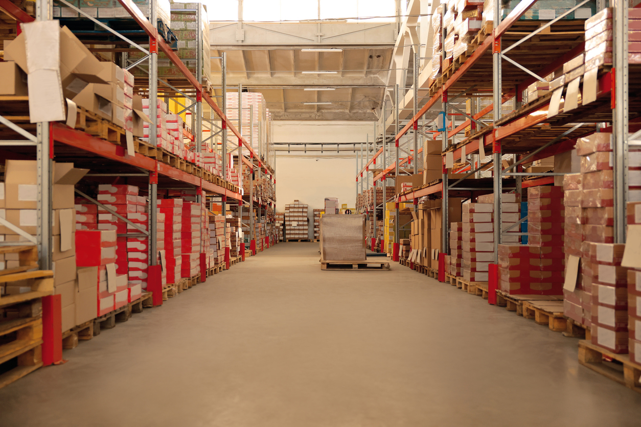 Warehouse with lots of boxes on racks. Wholesale business