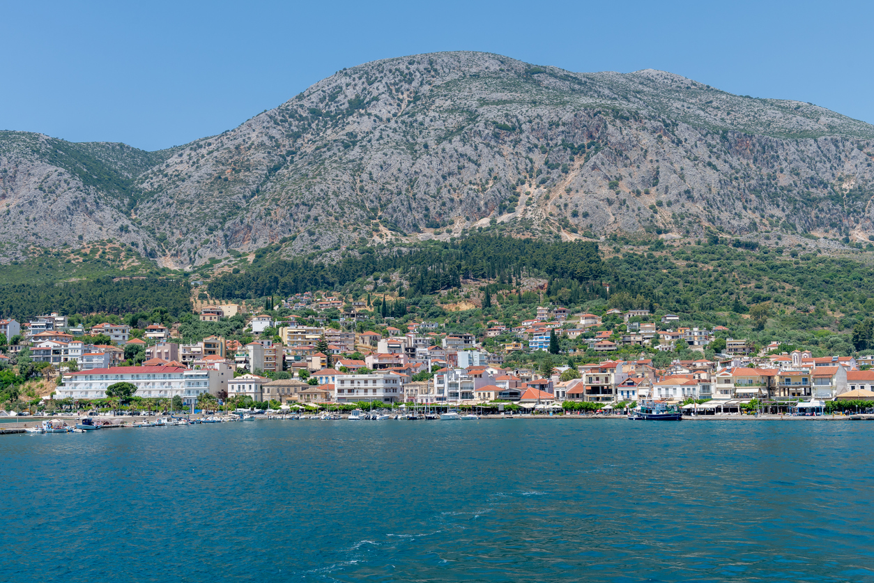 Ionian Sea, Greece-05.24.2022. A general view from the sea of the port town of Astakos on the Greek Ionian coast.