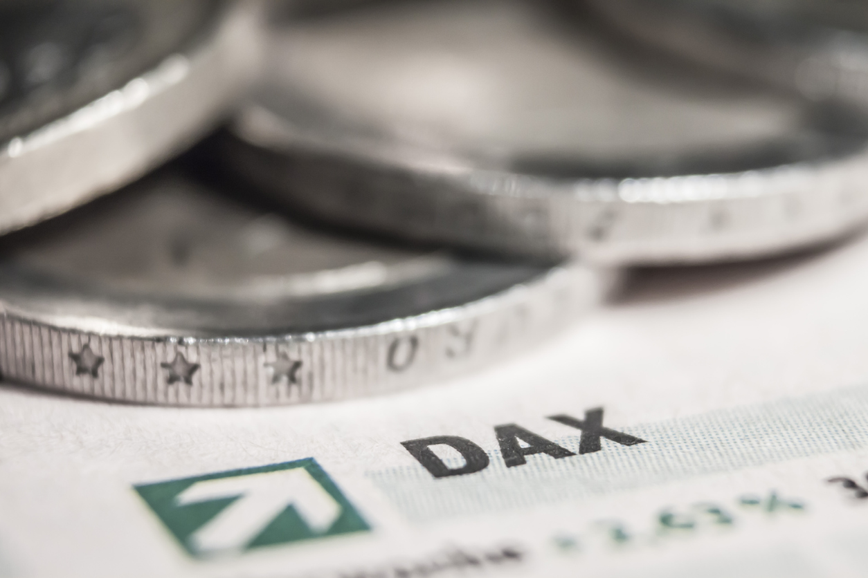 A macro shot of a dax sign with euro coins.