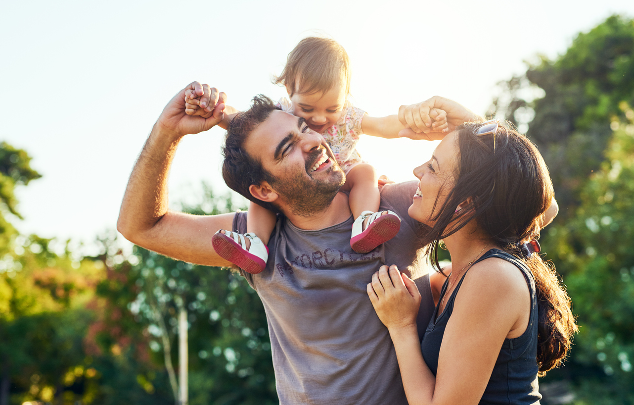 Shot of a young family outdoors