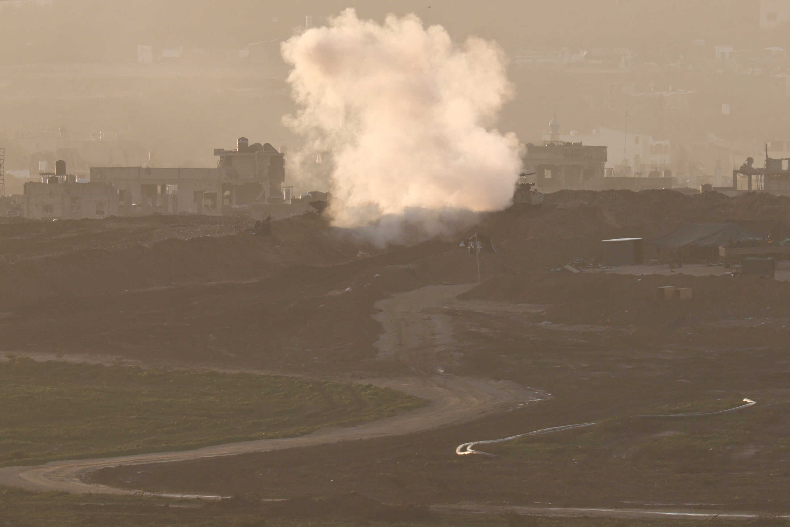 Smoke rises over Gaza, amid the ongoing conflict between Israel and the Palestinian Islamist group Hamas, as seen from Israel, January 15, 2024. REUTERS