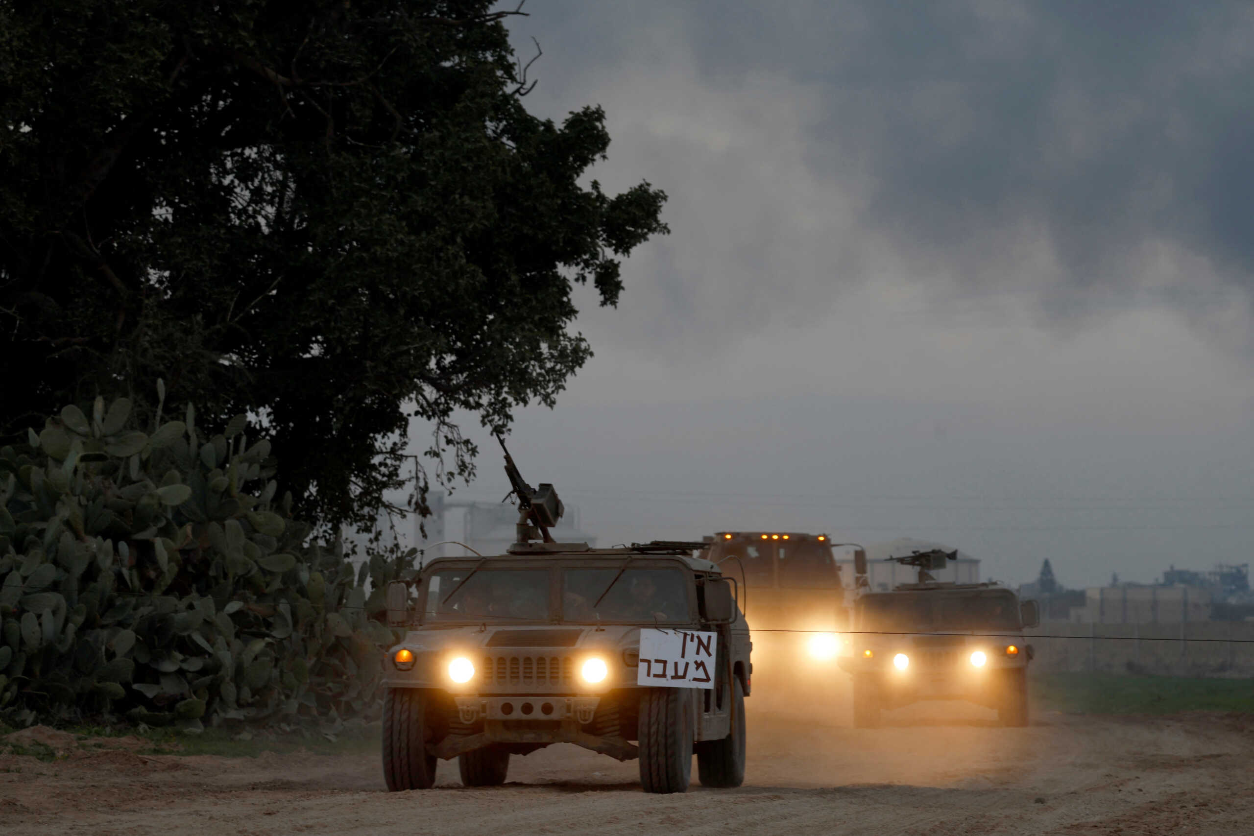 A convoy of Israeli military vehicles enters Israel from Gaza, amid the ongoing conflict between Israel and the Palestinian Islamist group Hamas, at the Israel-Gaza border, Israel, January 6, 2024. REUTERS
