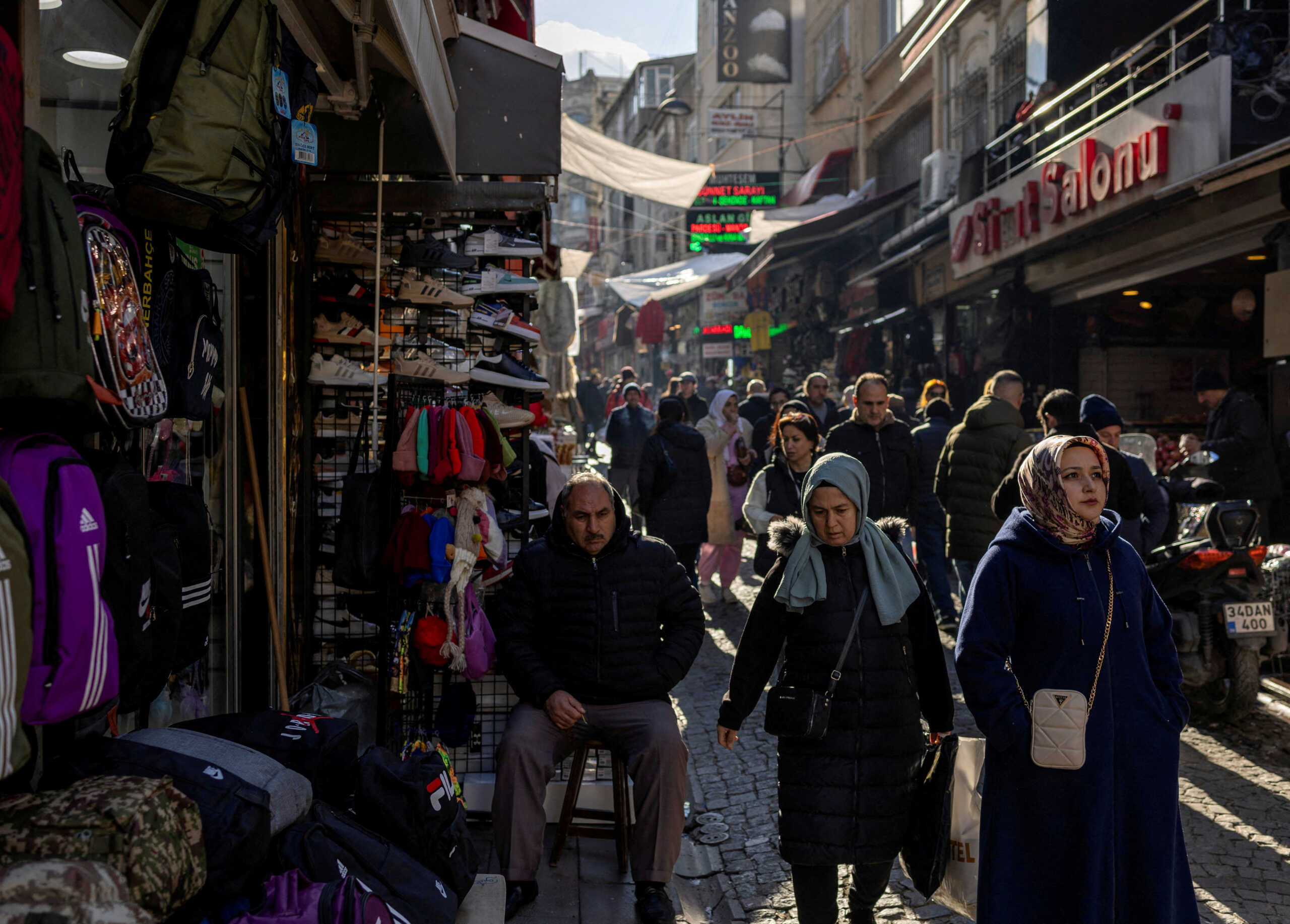 FILE PHOTO: People walk through a shopping street in Istanbul, Turkey November 27, 2023. REUTERS