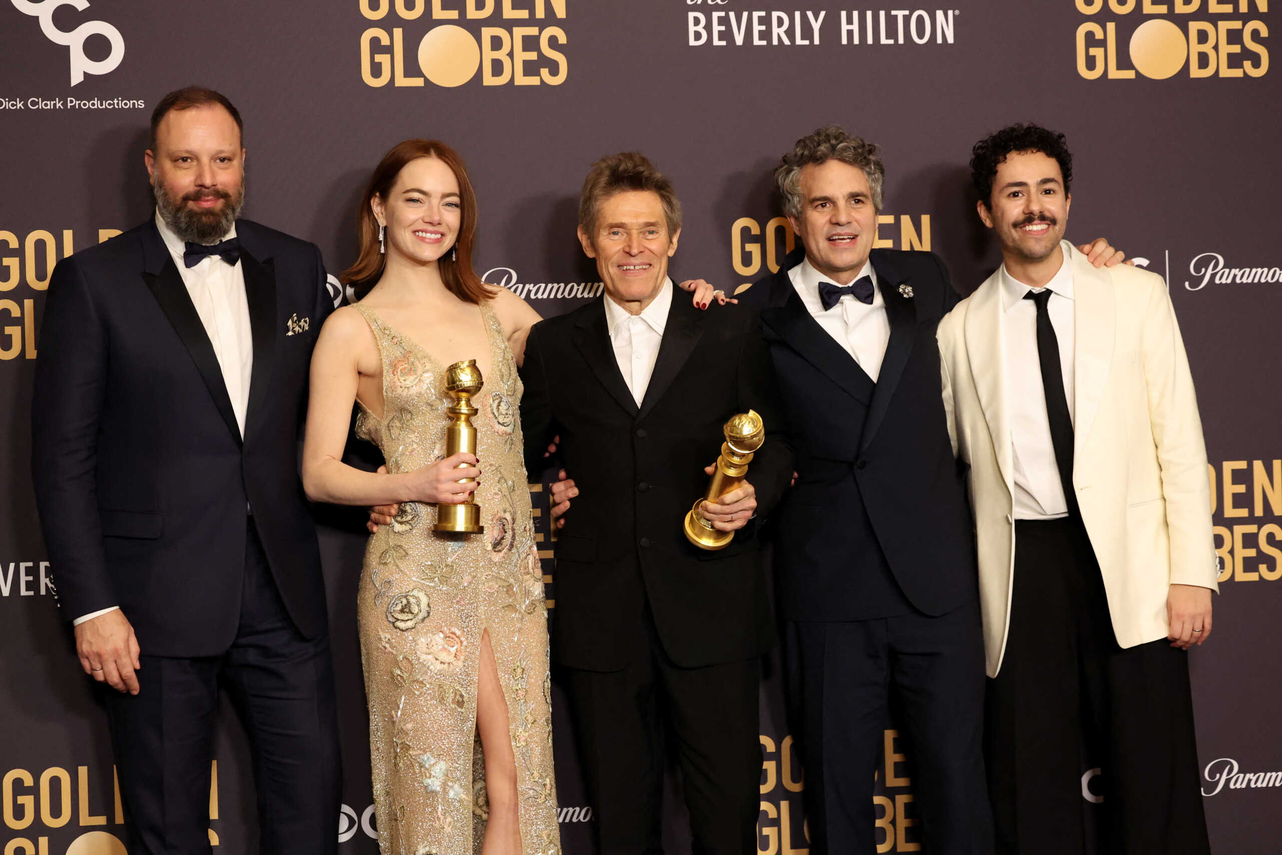 Yorgos Lanthimos, Emma Stone, Willem Dafoe, Mark Ruffalo and Ramy Youssef pose with the award for Best Motion Picture - Musical or Comedy award for "Poor Things", and Best Performance by a Female Actor in a Motion Picture - Musical or Comedy for "Poor Things", at the 81st Annual Golden Globe Awards in Beverly Hills, California, U.S., January 7, 2024. REUTERS