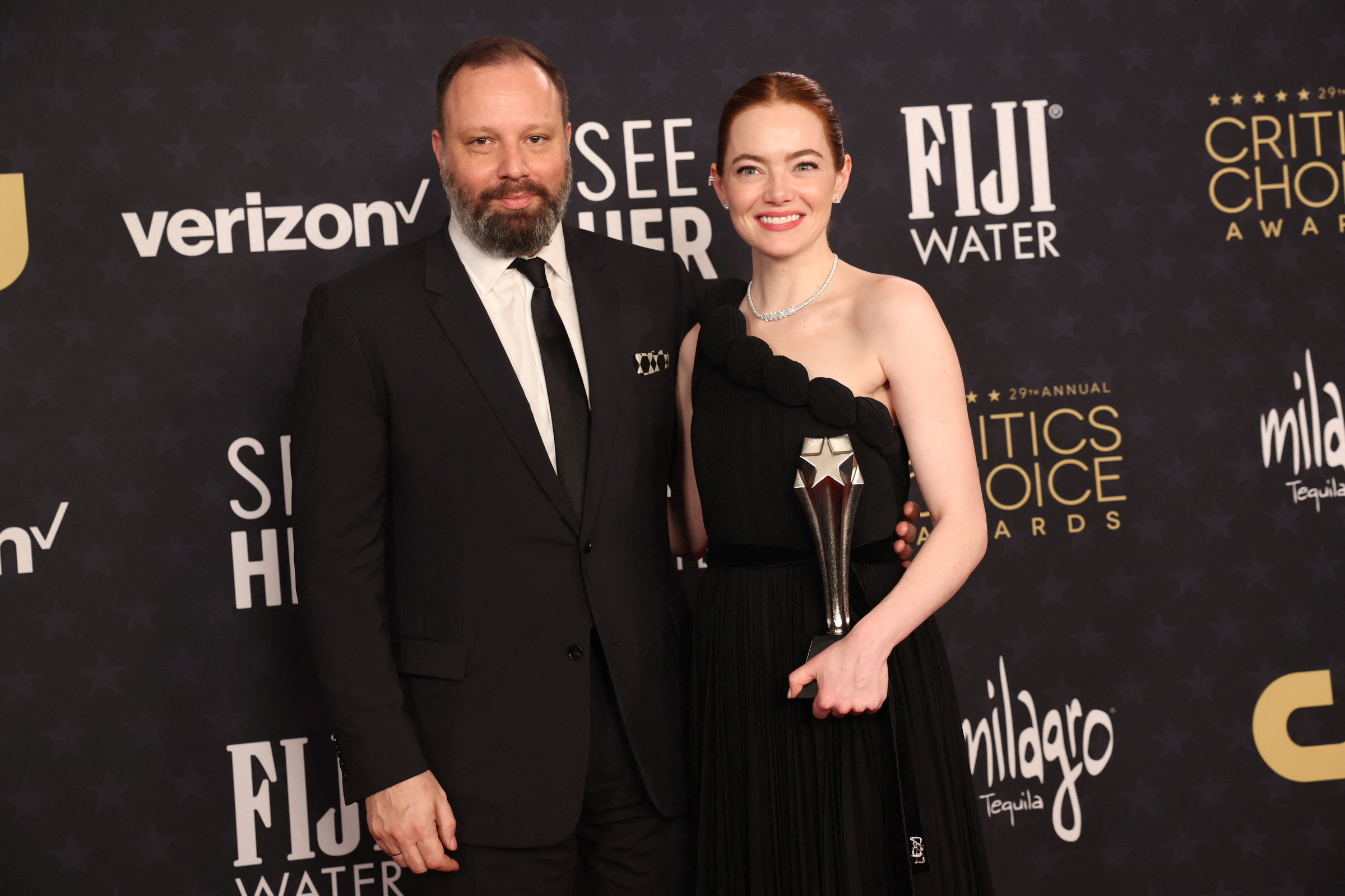Yorgos Lanthimos and Emma Stone pose with the Best Actress Award for "Poor Things," at the 29th Annual Critics Choice Awards, in Santa Monica, California, U.S., January 14, 2024. REUTERS
