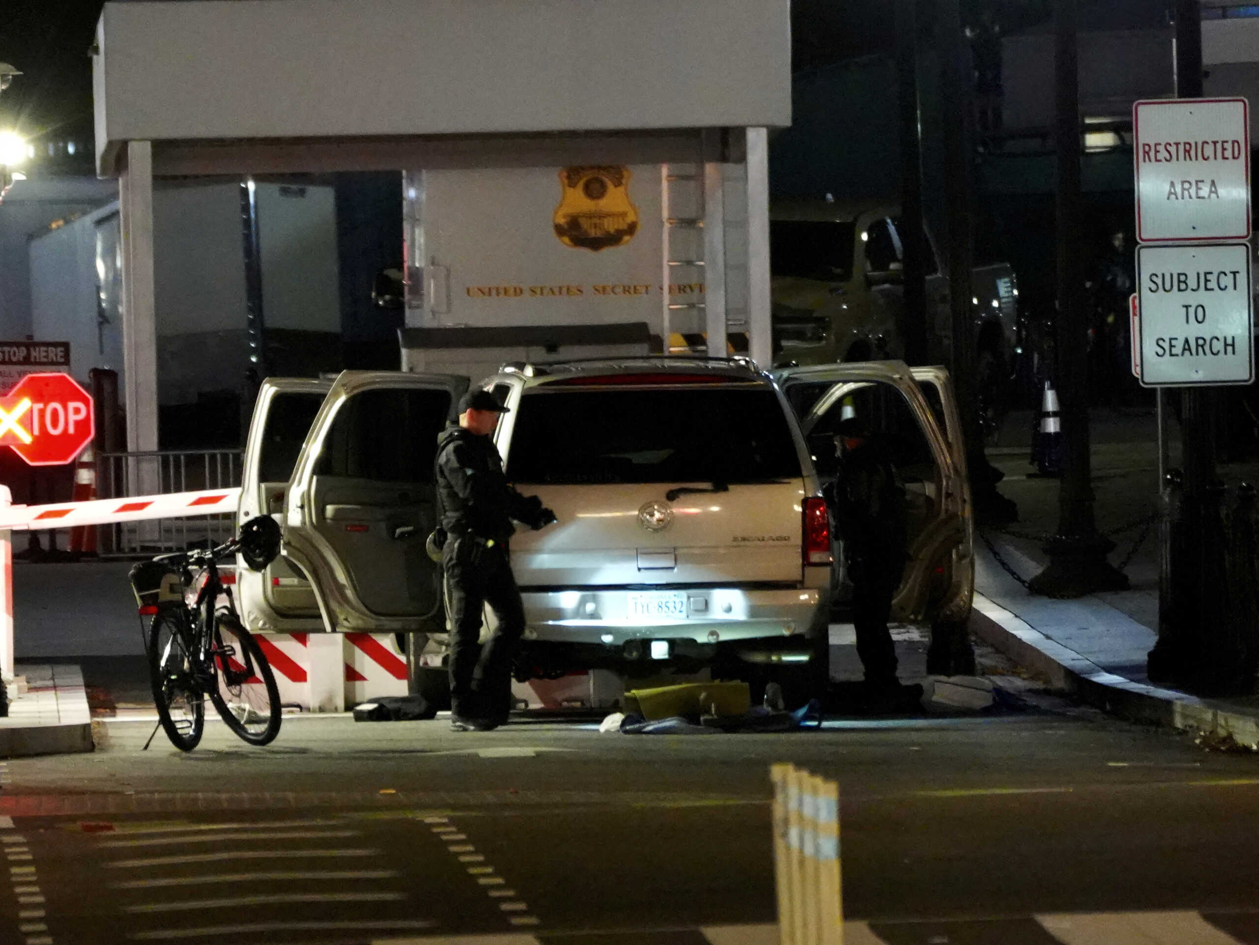 Members of the U.S. Secret Service work at the site of a vehicle crash at a perimeter gate of the White House, while U.S. President Joe Biden was away on a trip, in Washington, U.S., January 8, 2024 in this picture obtained from social media. Andrew Leyden