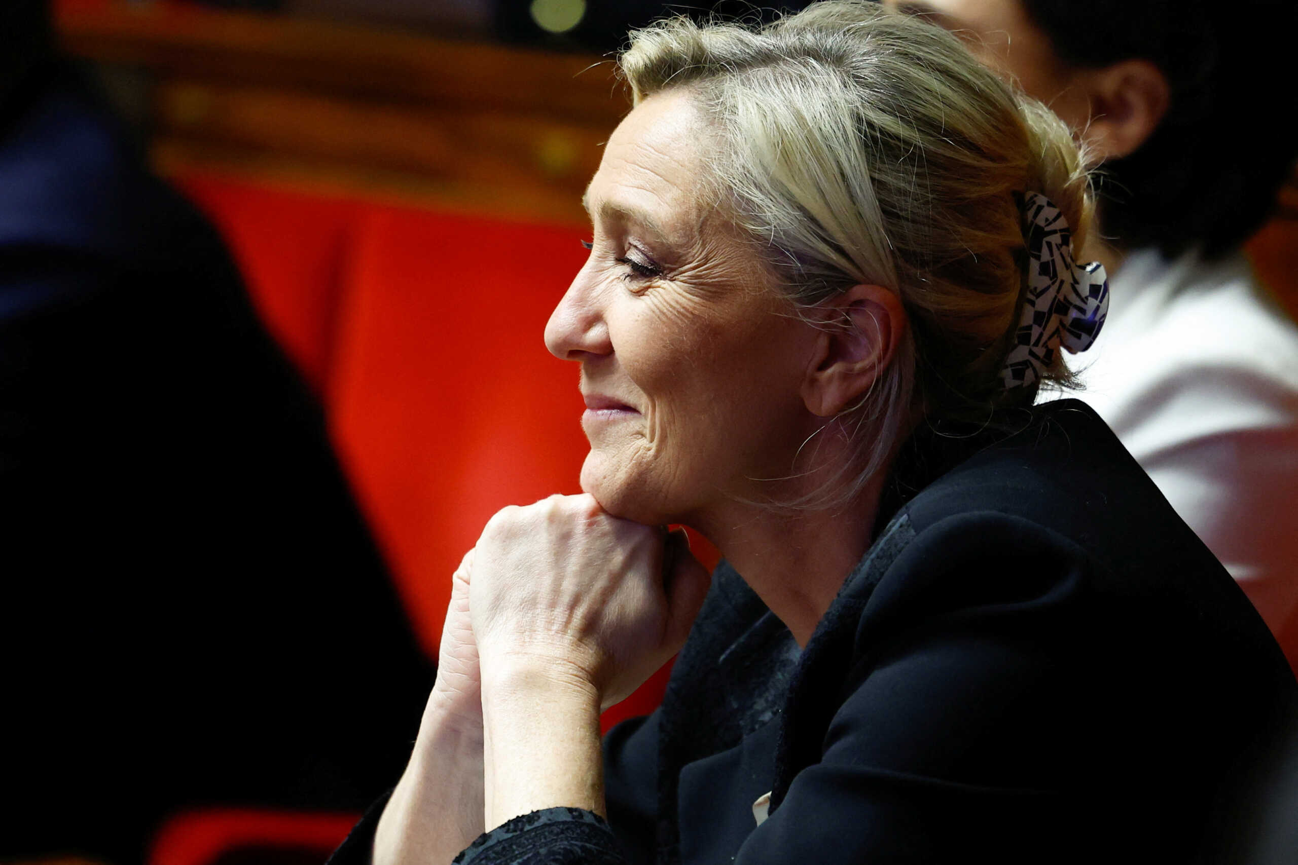 Deputy Marine Le Pen looks on on the day of a vote by members of parliament on immigration bill at the National Assembly in Paris, France, December 19, 2023. REUTERS
