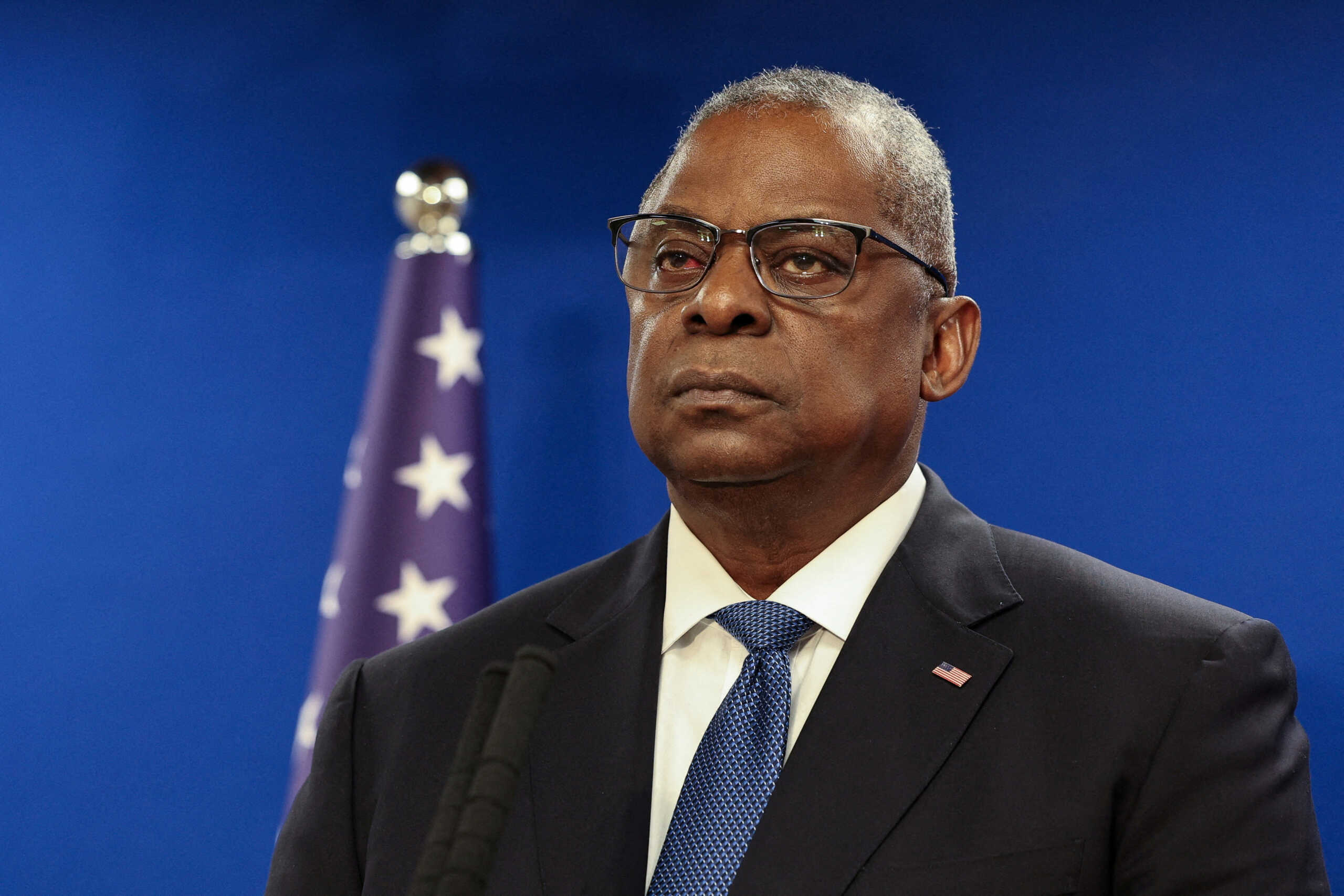 FILE PHOTO: U.S. Secretary of Defense Lloyd Austin looks on during a joint press conference with Israeli Defense Minister Yoav Gallant at Israel's Ministry of Defense in Tel Aviv, Israel December 18, 2023. REUTERS