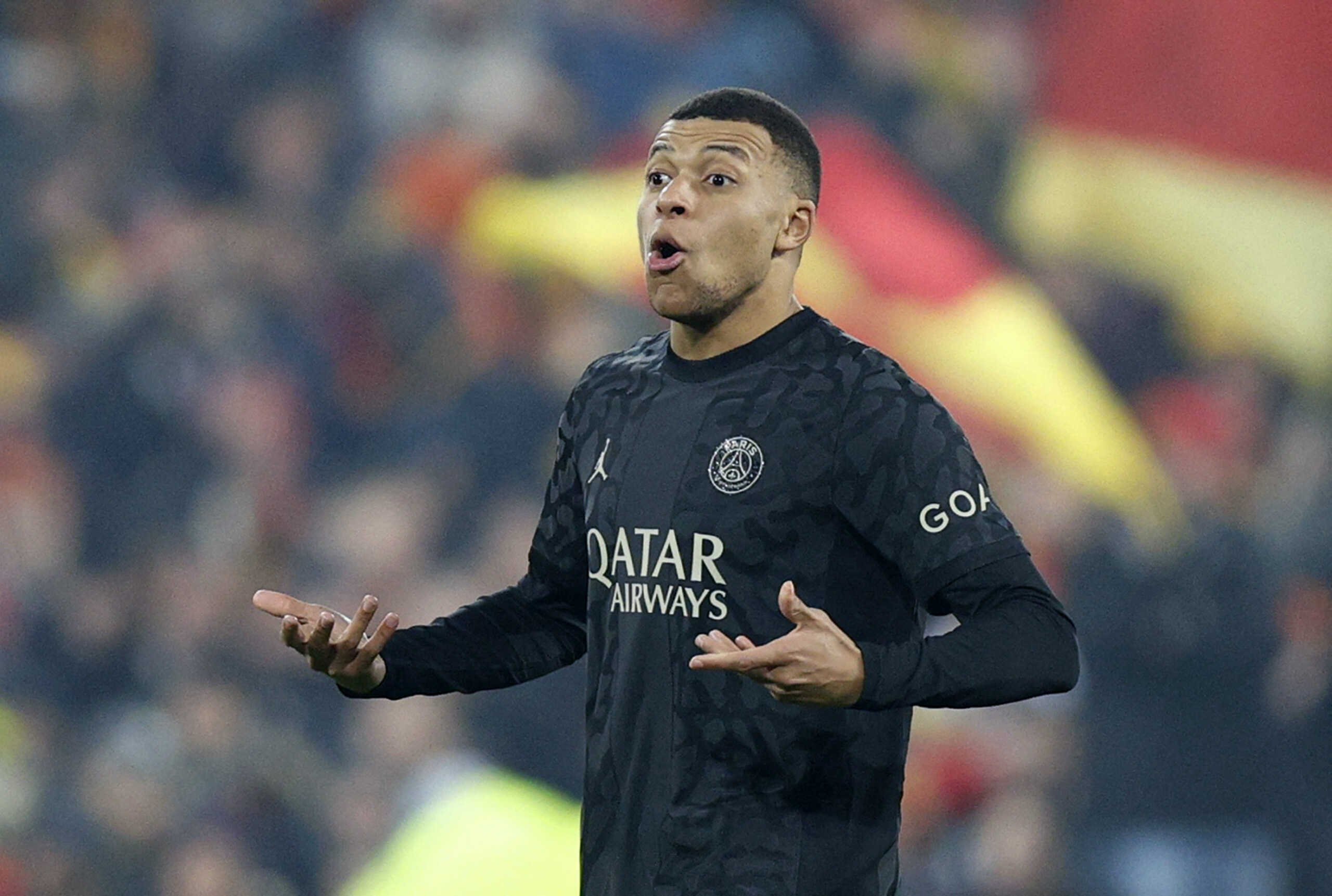 Soccer Football - Ligue 1 - RC Lens v Paris St Germain - Stade Bollaert-Delelis, Lens, France - January 14, 2024 Paris St Germain's Kylian Mbappe reacts REUTERS