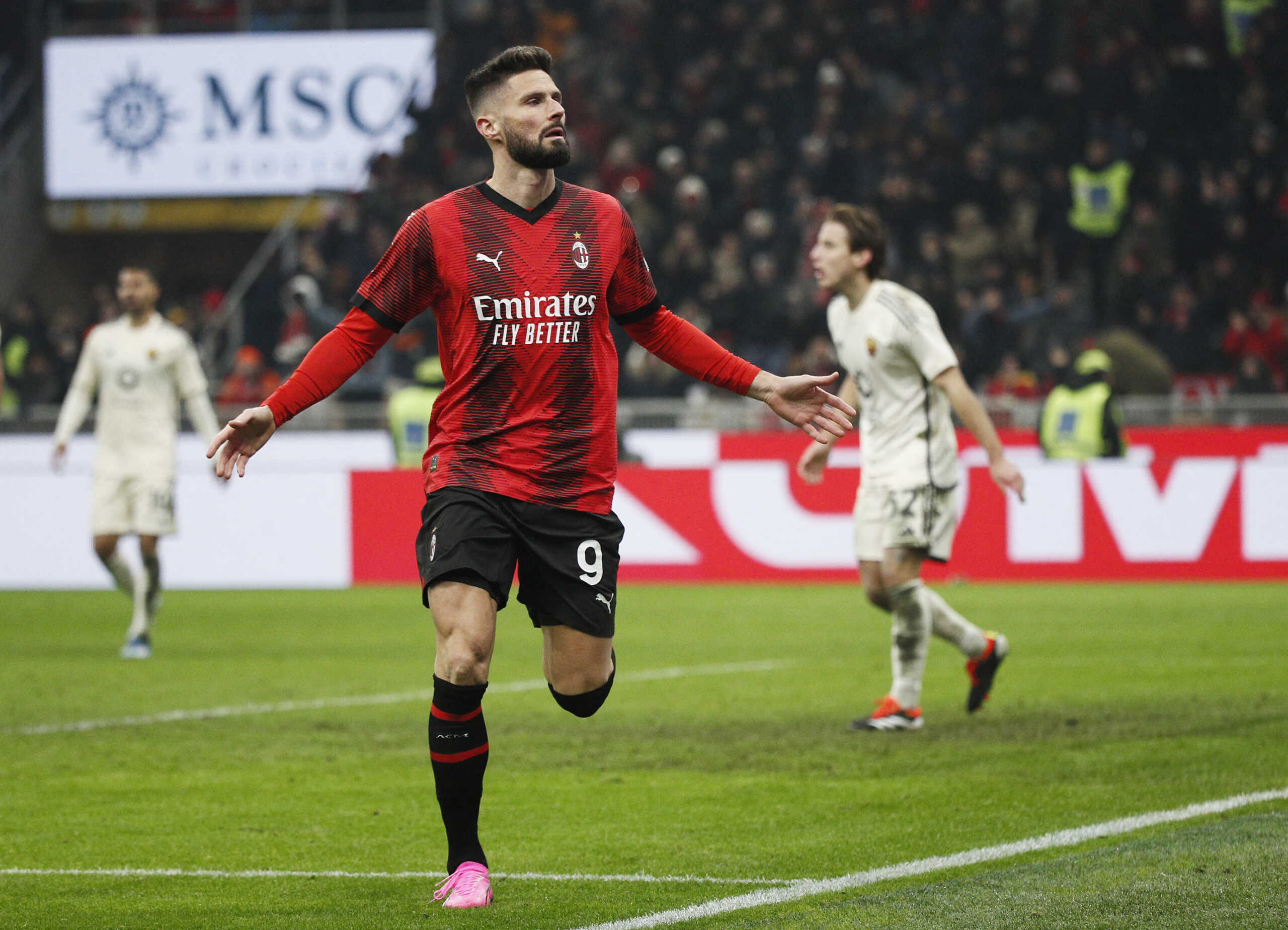 Soccer Football - Serie A - AC Milan v AS Roma - San Siro, Milan, Italy - January 14, 2024 AC Milan's Olivier Giroud celebrates scoring their second goal REUTERS