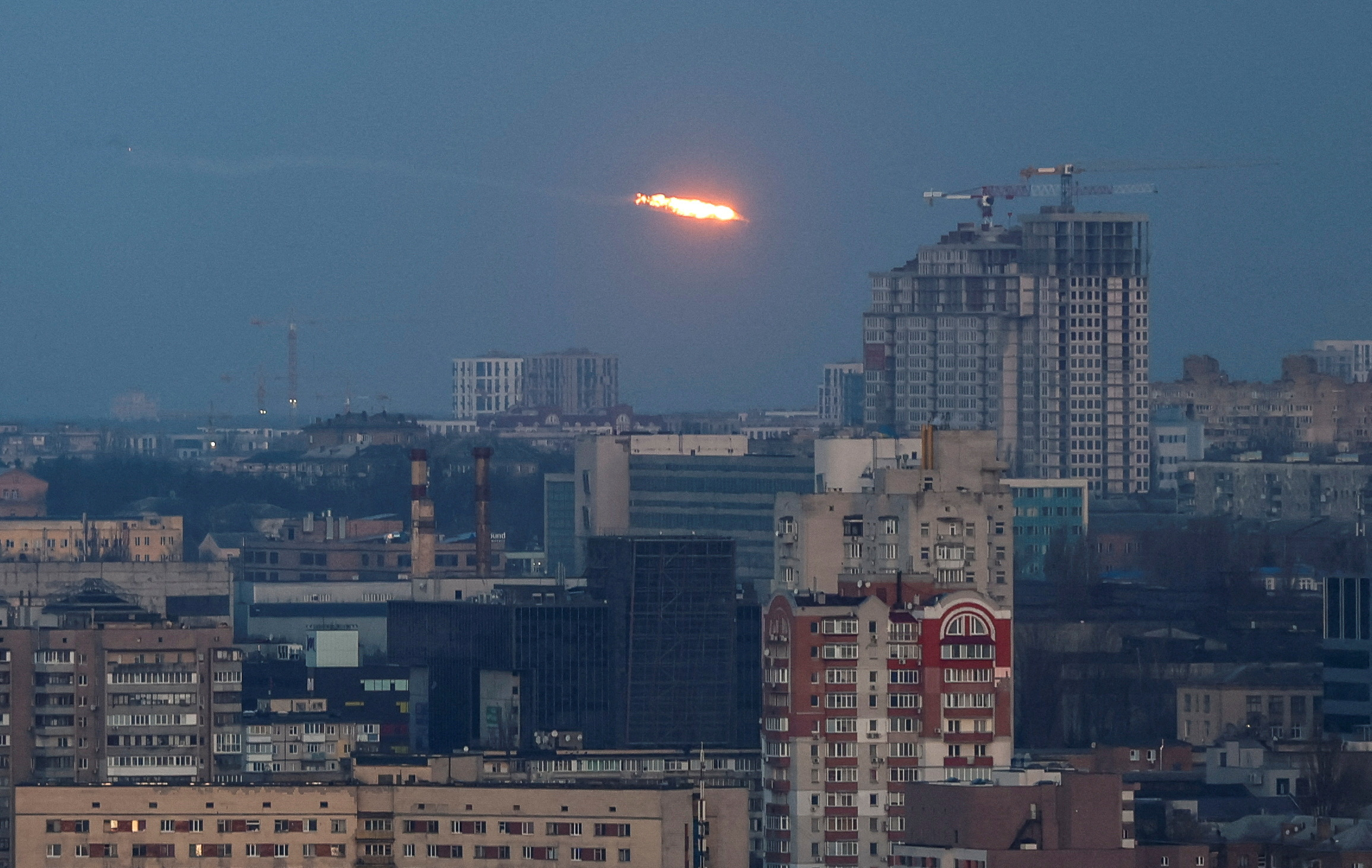 An explosion of a missile is seen in the sky over the city during a Russian missile and drone strike, amid Russia's attack on Ukraine, in Kyiv, Ukraine December 29, 2023. REUTERS