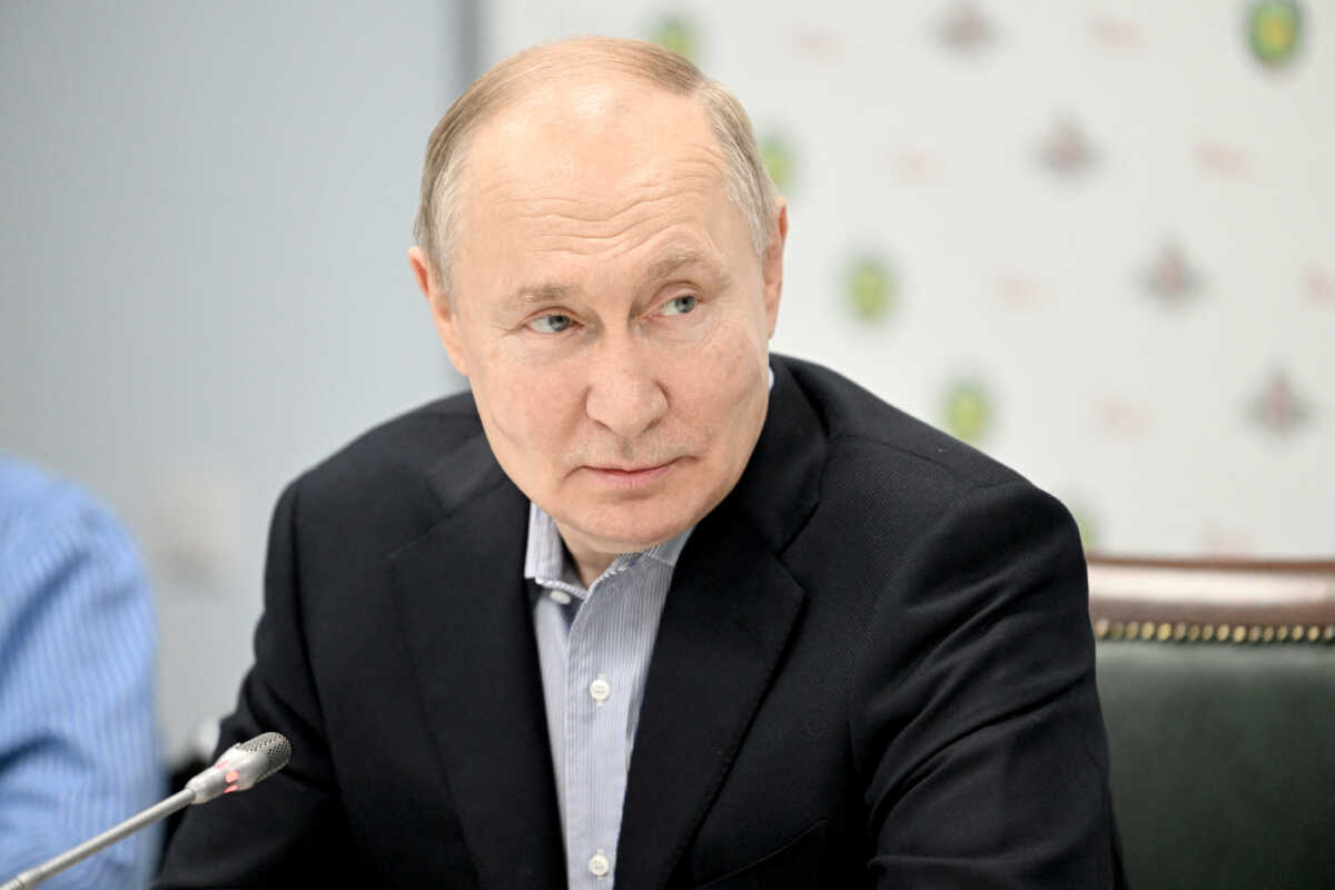 Russian President Vladimir Putin meets with service members, who were wounded in the course of a conflict in Ukraine, as he visits the A.A. Vishnevsky Central Military Clinical Hospital of Russia's Ministry of Defence on the outskirts of Moscow, Russia, January 1, 2024. Sputnik