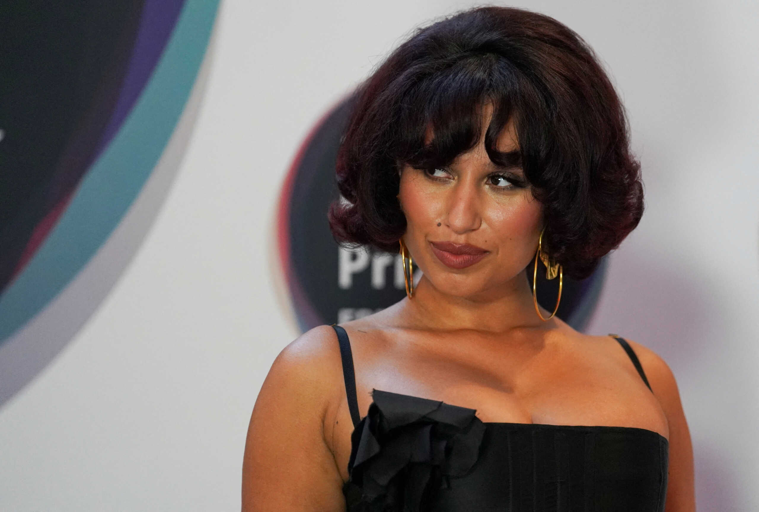 FILE PHOTO: Raye poses for a photograph at the Mercury Music Prize awards in London, Britain, September 7, 2023. REUTERS