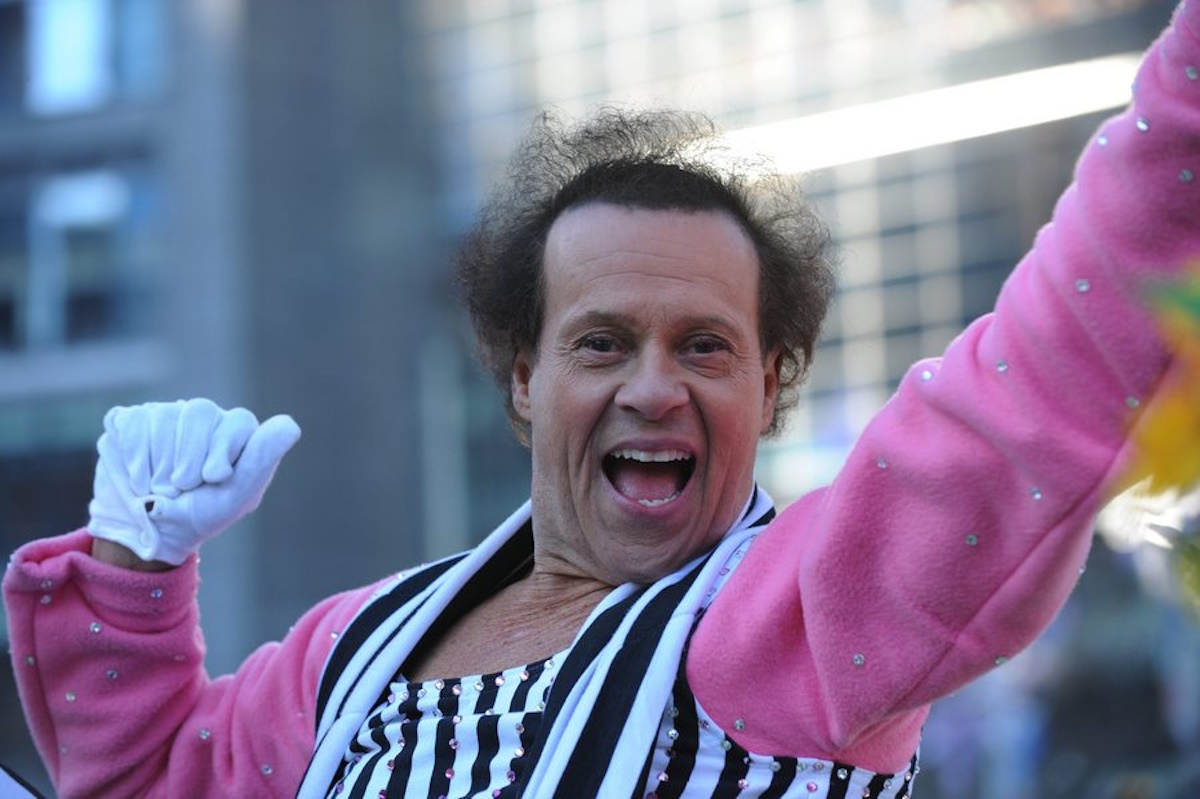 epa03969032 US fitness personality Richard Simmons, rides a float in the Macy's 87th Annual Thanksgiving Day Parade in New York City, USA, 28 November 2013. The annual parade, which began in 1924, features giant balloons of characters from popular culture floating above the streets of Manhattan.  EPA
