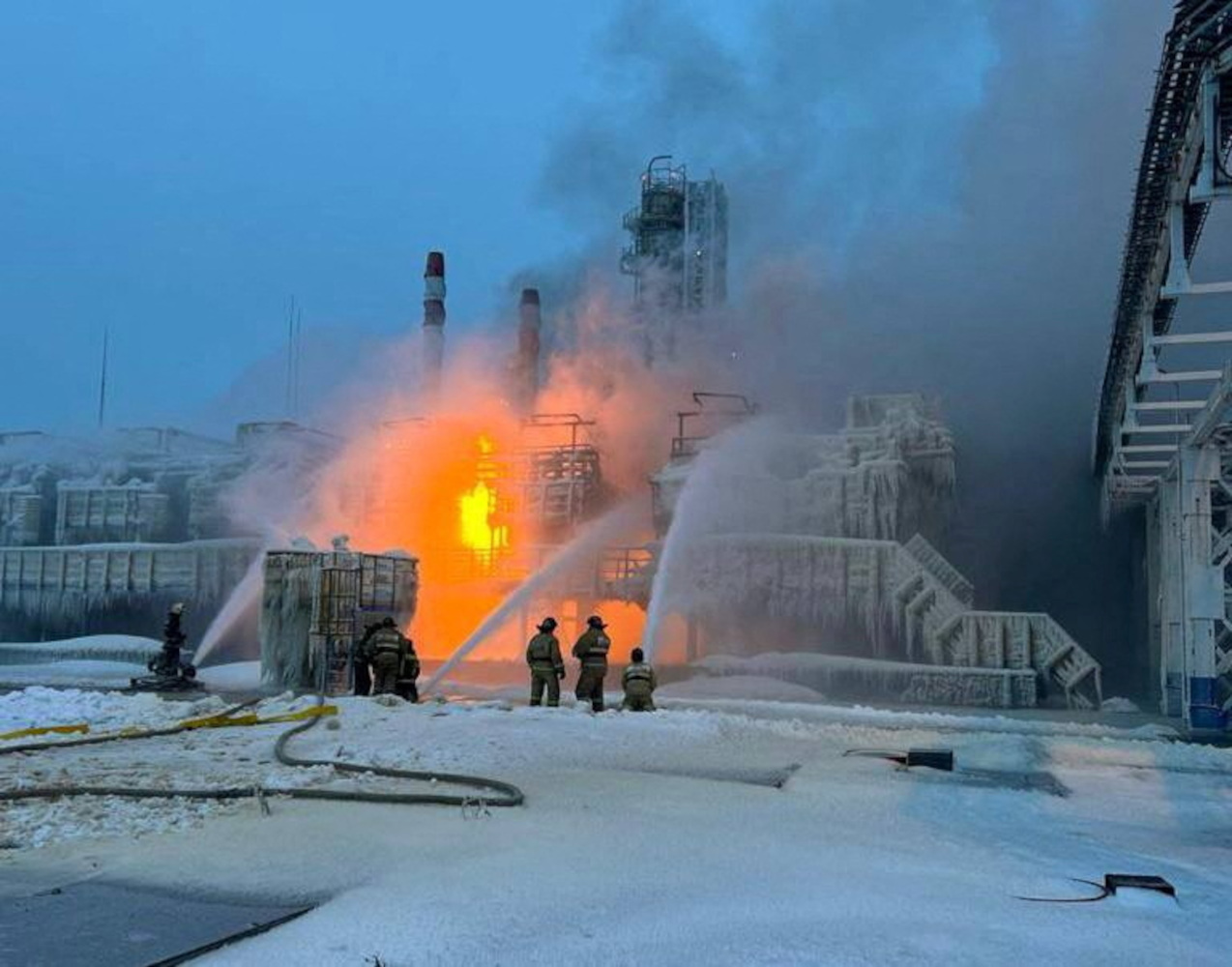 Firefighters work to extinguish fire at the Novatek terminal in the port of Ust-Luga, Russia, January 21, 2024. Leningrad Region's Governor Alexander Drozdenko Telegram channel via REUTERS ATTENTION EDITORS - THIS IMAGE HAS BEEN SUPPLIED BY A THIRD PARTY. NO RESALES. NO ARCHIVES. MANDATORY CREDIT.