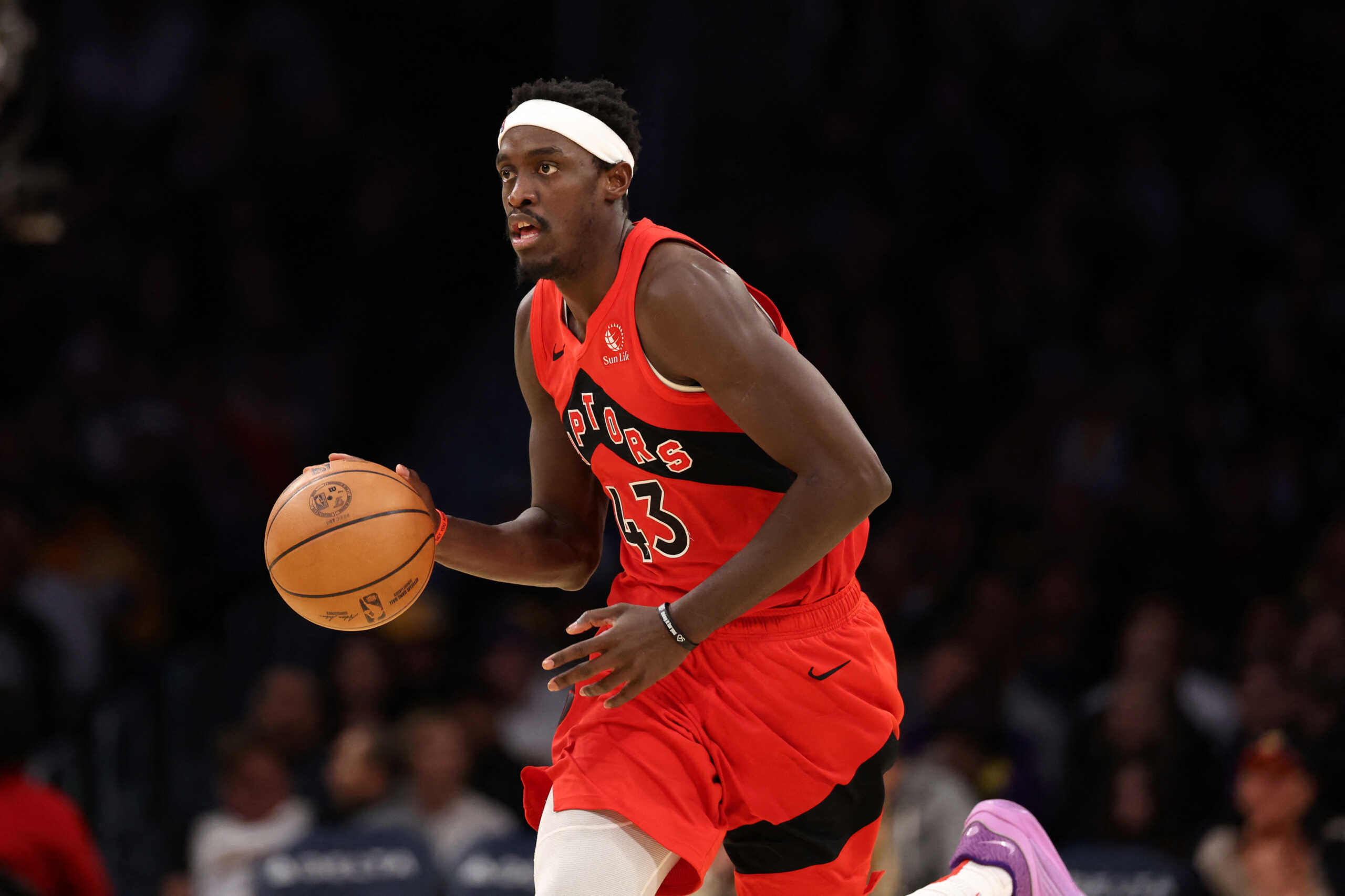 Jan 9, 2024; Los Angeles, California, USA;  Toronto Raptors forward Pascal Siakam (43) dribbles the ball during the third quarter against the Los Angeles Lakers at Crypto.com Arena. Mandatory Credit: Kiyoshi Mio-USA TODAY Sports