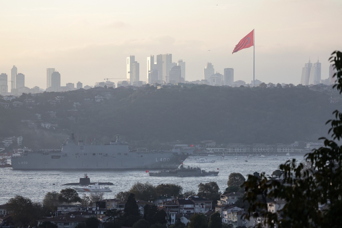 epa10947780 Turkey’s first amphibious assault ship TCG Anadolu L400 and navy ships and submarines sail on Bosphorus during celebrations of the 100th anniversary of the Turkish Republic in Istanbul, Turkey, 29 October 2023. The 100th anniversary of the proclamation of the Republic of Turkey by Mustafa Kemal Ataturk in 1923, known as Republic Day, took place on 29 October 2023. The celebrations included events such as drone and fireworks displays, celebration marches and commemoration ceremonies.  EPA