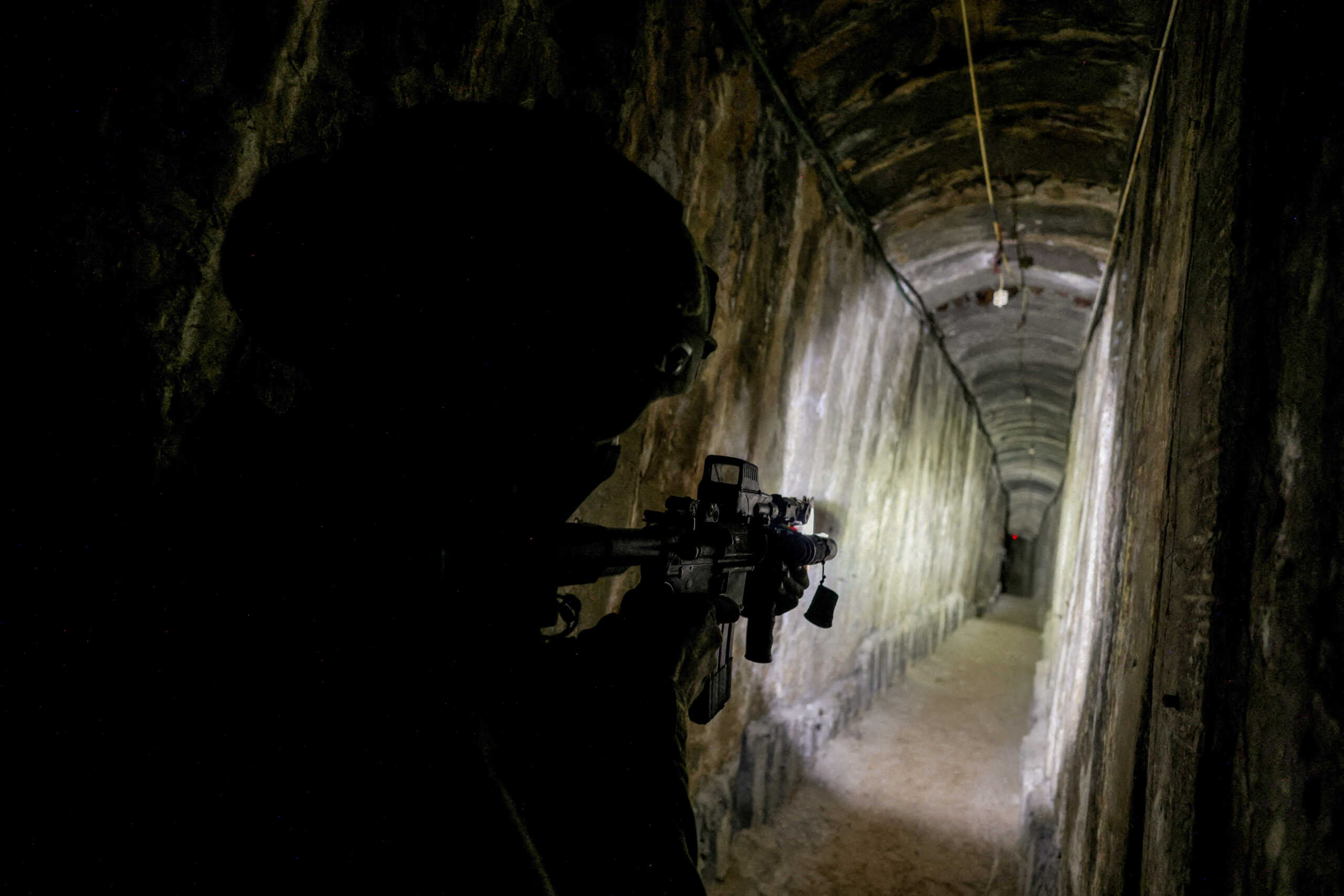 FILE PHOTO: An Israeli soldier secures a tunnel underneath Al Shifa Hospital in Gaza City, amid the ongoing ground operation of the Israeli army against Palestinian Islamist group Hamas, in the northern Gaza Strip, November 22, 2023. REUTERS