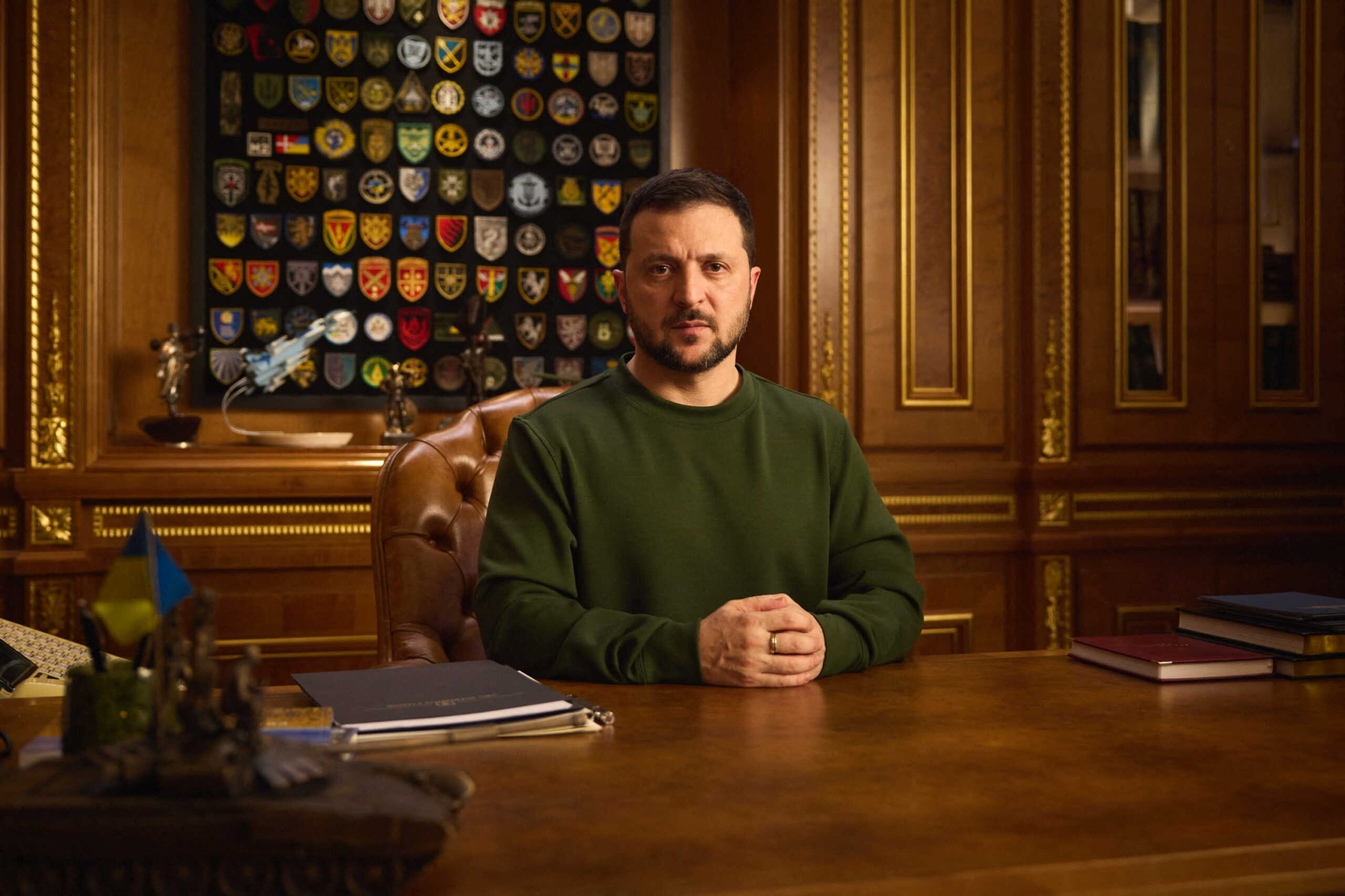 Ukraine's President Volodymyr Zelenskiy addresses Ukrainian people on the New Year's eve, amid Russia's attack on Ukraine, in Kyiv, Ukraine, in this handout picture released ond December 31, 2023. Ukrainian Presidential Press Service