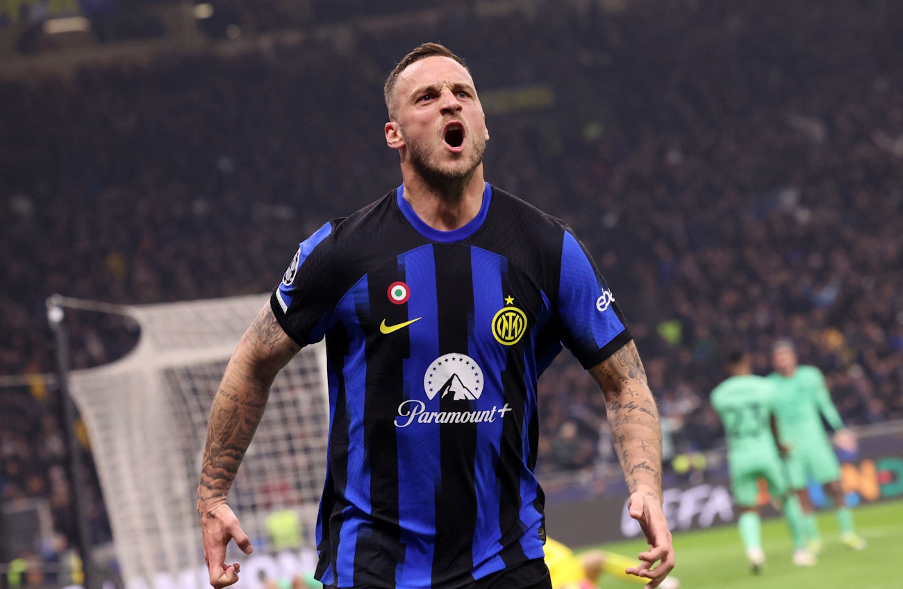 Soccer Football - Champions League - Round of 16 - First Leg - Inter Milan v Atletico Madrid - San Siro, Milan, Italy - February 20, 2024 Inter Milan's Marko Arnautovic celebrates scoring their first goal REUTERS