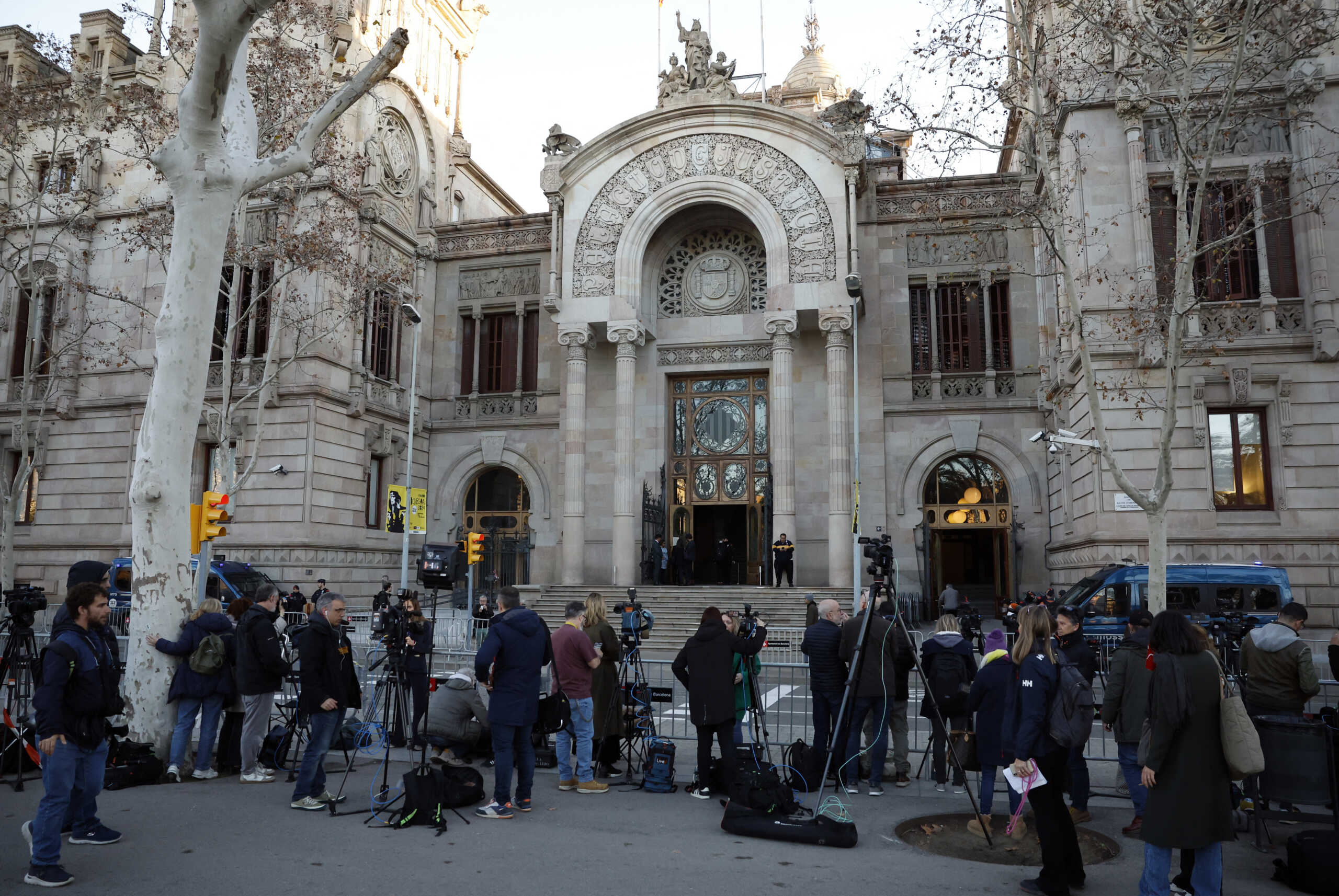 Soccer Football - Brazil's Dani Alves stands trial for alleged sexual assault - Barcelona Court, Barcelona, Spain - February 5, 2024 Members of the media are seen outside the court before the hearing REUTERS