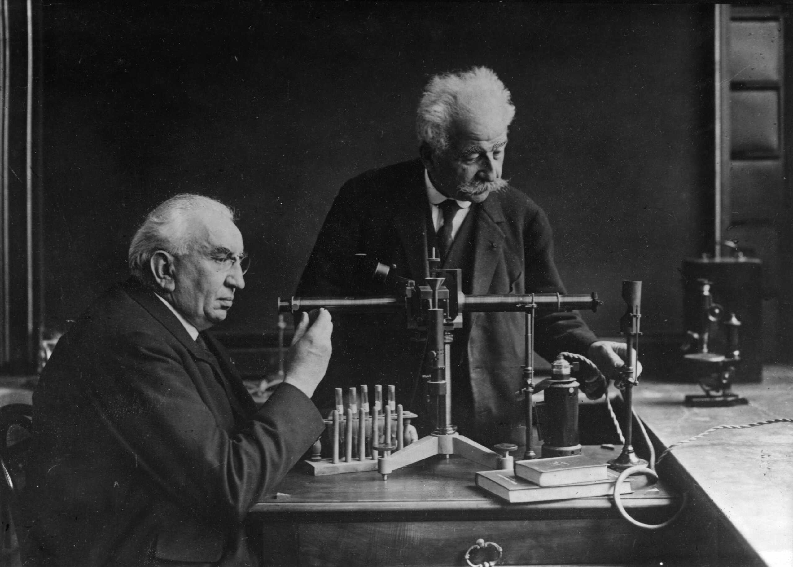 The brothers, Louis and Auguste Lumiere, famous French scientists who are credited to be the first filmmakers in history, in their workshop, Lyons, France, early to mid 20th century. (Photo by Visual Studies Workshop