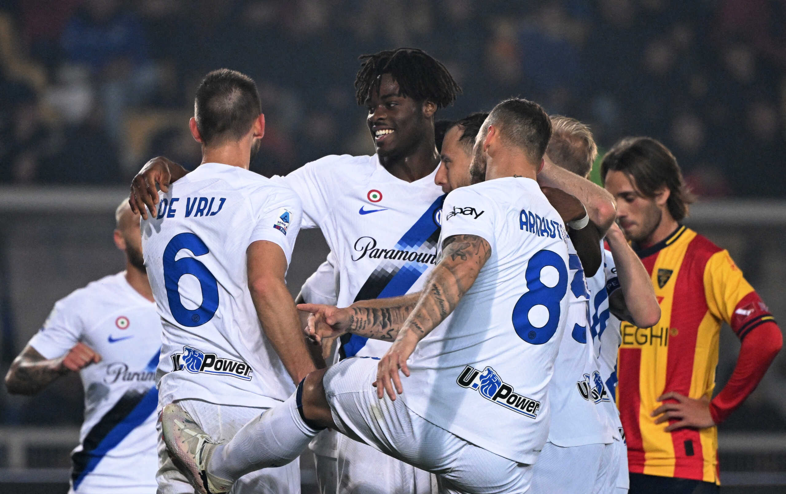 Soccer Football - Serie A - Lecce v Inter Milan - Stadio Via del mare, Lecce, Italy - February 25, 2024 Inter Milan's Stefan de Vrij celebrates scoring their fourth goal with Yann Aurel Bisseck and Marko Arnautovic REUTERS