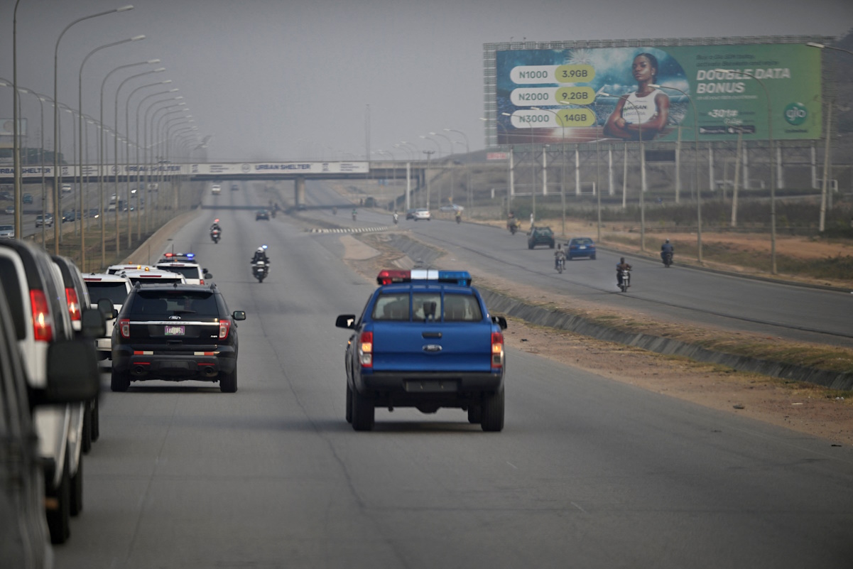 The motorcade carrying US Secretary of State Antony Blinken is escorted by police vehicles on a freeway in Abuja, Nigeria, January 23, 2024.     Andrew Caballero-Reynolds