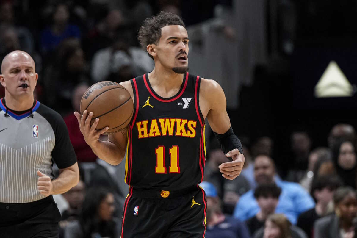 Feb 5, 2024; Atlanta, Georgia, USA; Atlanta Hawks guard Trae Young (11) brings the ball up the court against the LA Clippers during the first half at State Farm Arena. Mandatory Credit: Dale Zanine-USA TODAY Sports