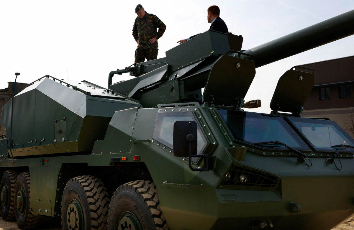 Commander of the Armed Forces of Netherlands Onno Eichelsheim stands on a DITA howitzer-gun vehicle outside an arms factory in Sternberk, Czech Republic, February 27, 2024. REUTERS