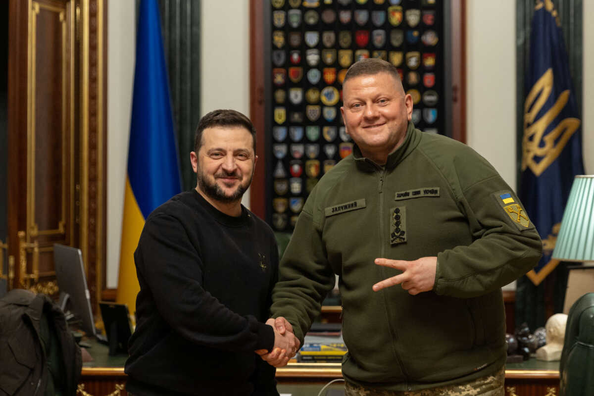 Ukraine's President Volodymyr Zelenskiy and Commander in Chief of the Ukrainian Armed Forces Valerii Zaluzhnyi shake hand and pose for a picture during their meeting, amid Russia's attack on Ukraine, in Kyiv, Ukraine February 8, 2024. Ukrainian Presidential Press Service