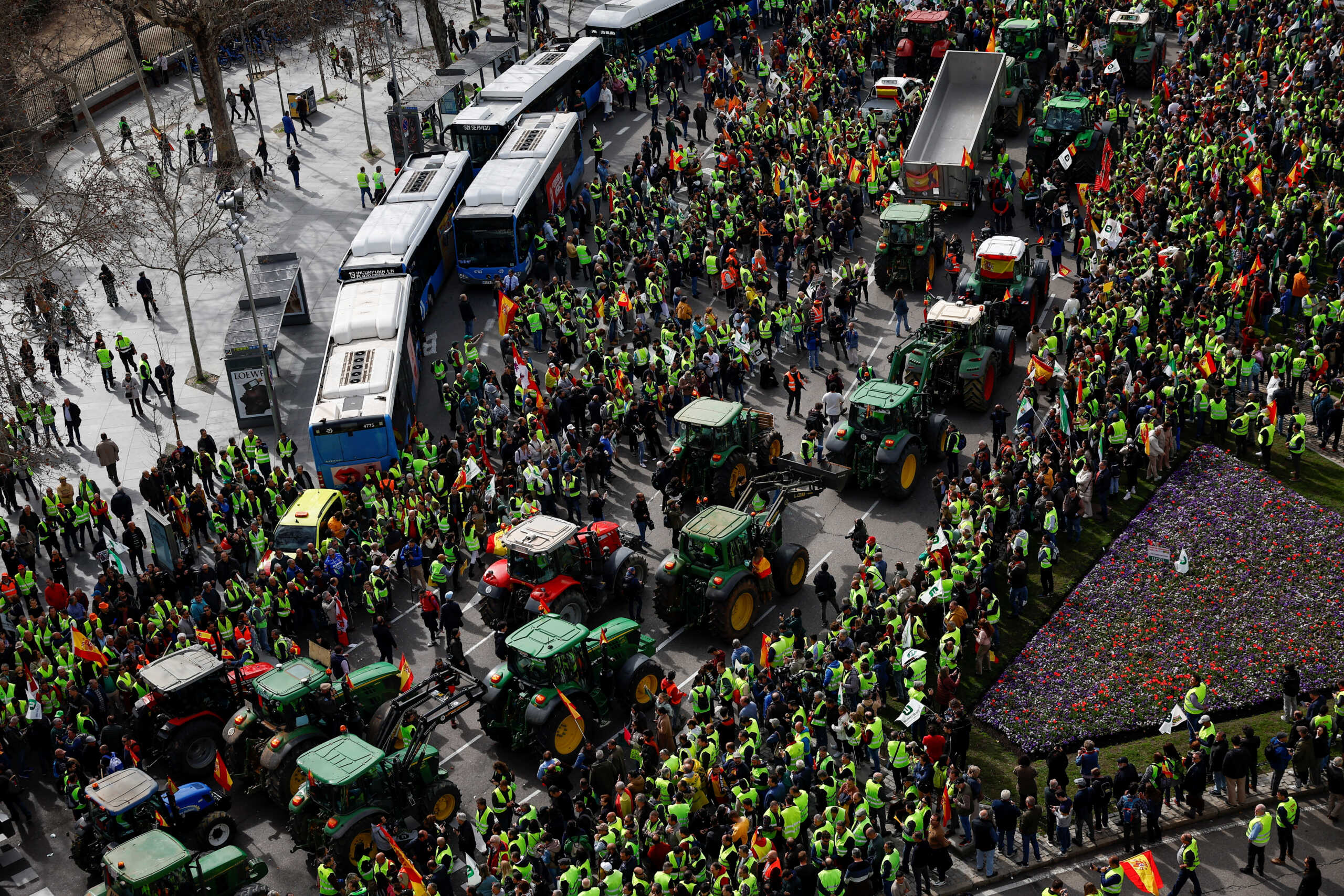 Spanish farmers attend a protest over price pressures, taxes and green regulation, grievances shared by farmers across Europe, at Puerta de Alcala in Madrid, Spain, February 21, 2024. REUTERS