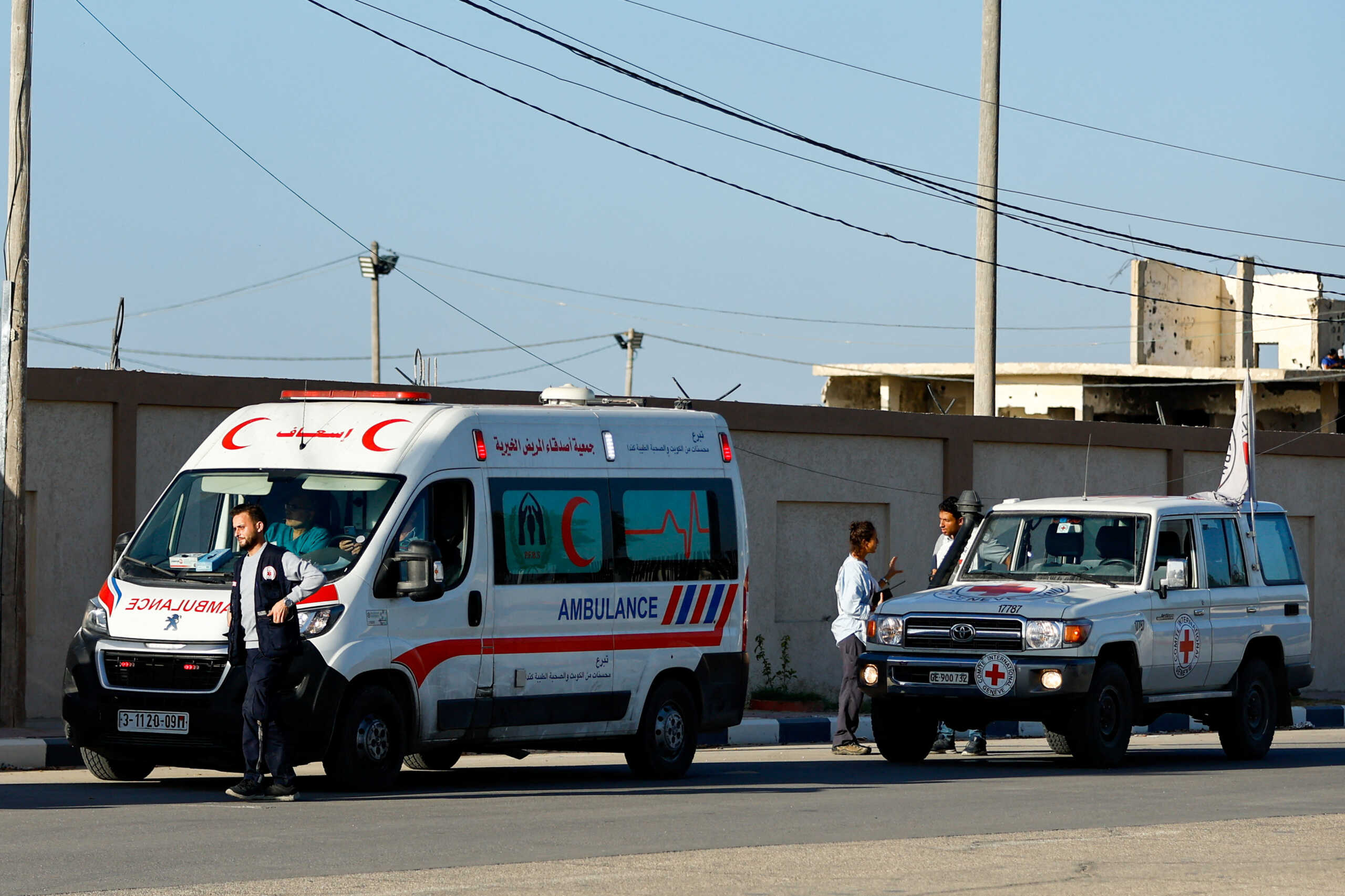 FILE PHOTO: An ambulance for injured Palestinians who will be transported to receive treatments at Egyptian hospitals, waits to move towards the Egyptian side of Rafah crossing, in Rafah in the southern Gaza Strip, November 7, 2023. REUTERS
