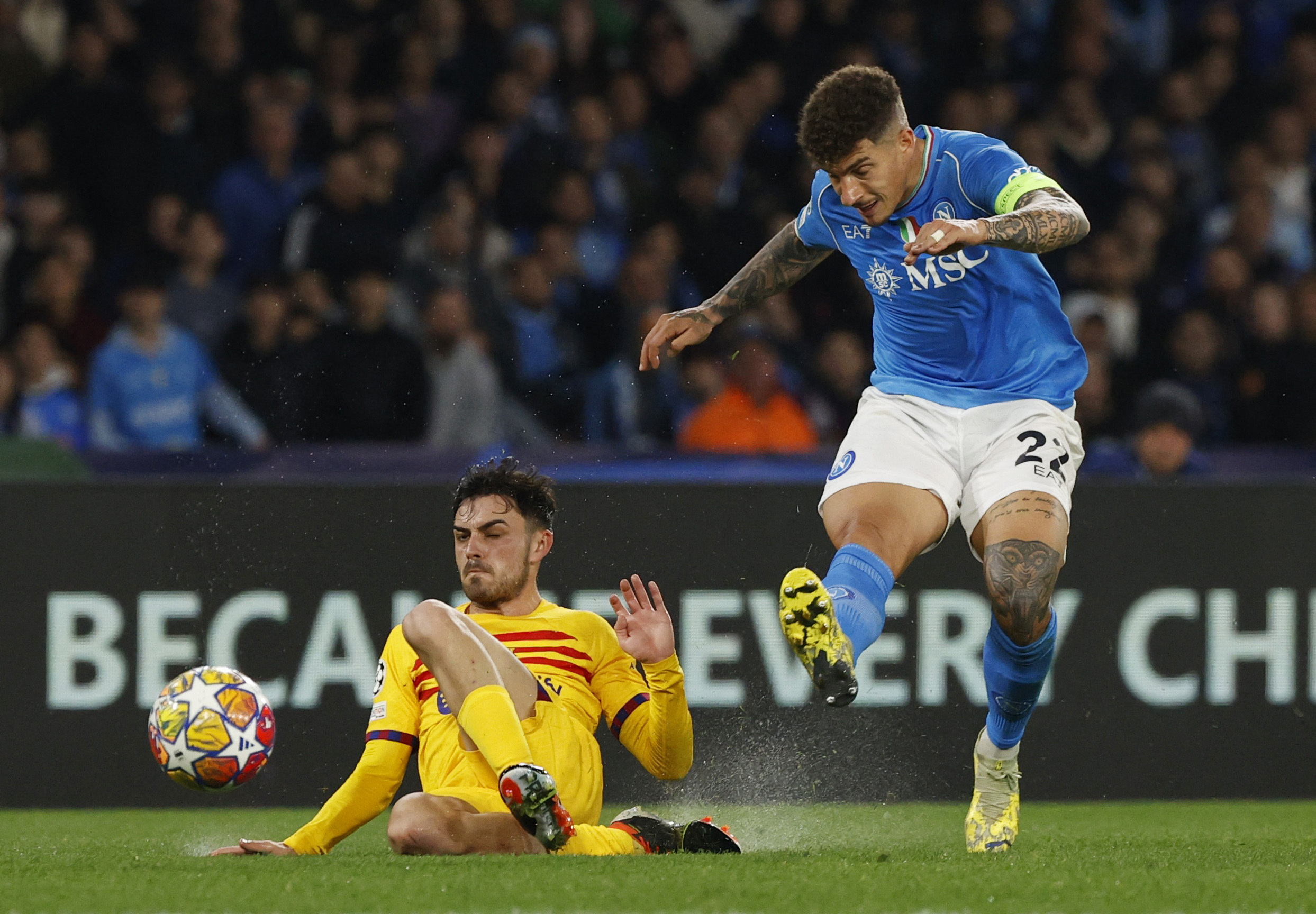 Soccer Football - Champions League - Round of 16 - First Leg - Napoli v FC Barcelona - Stadio Diego Armando Maradona, Naples, Italy - February 21, 2024 FC Barcelona's Pedri in action with Napoli's Giovanni Di Lorenzo REUTERS