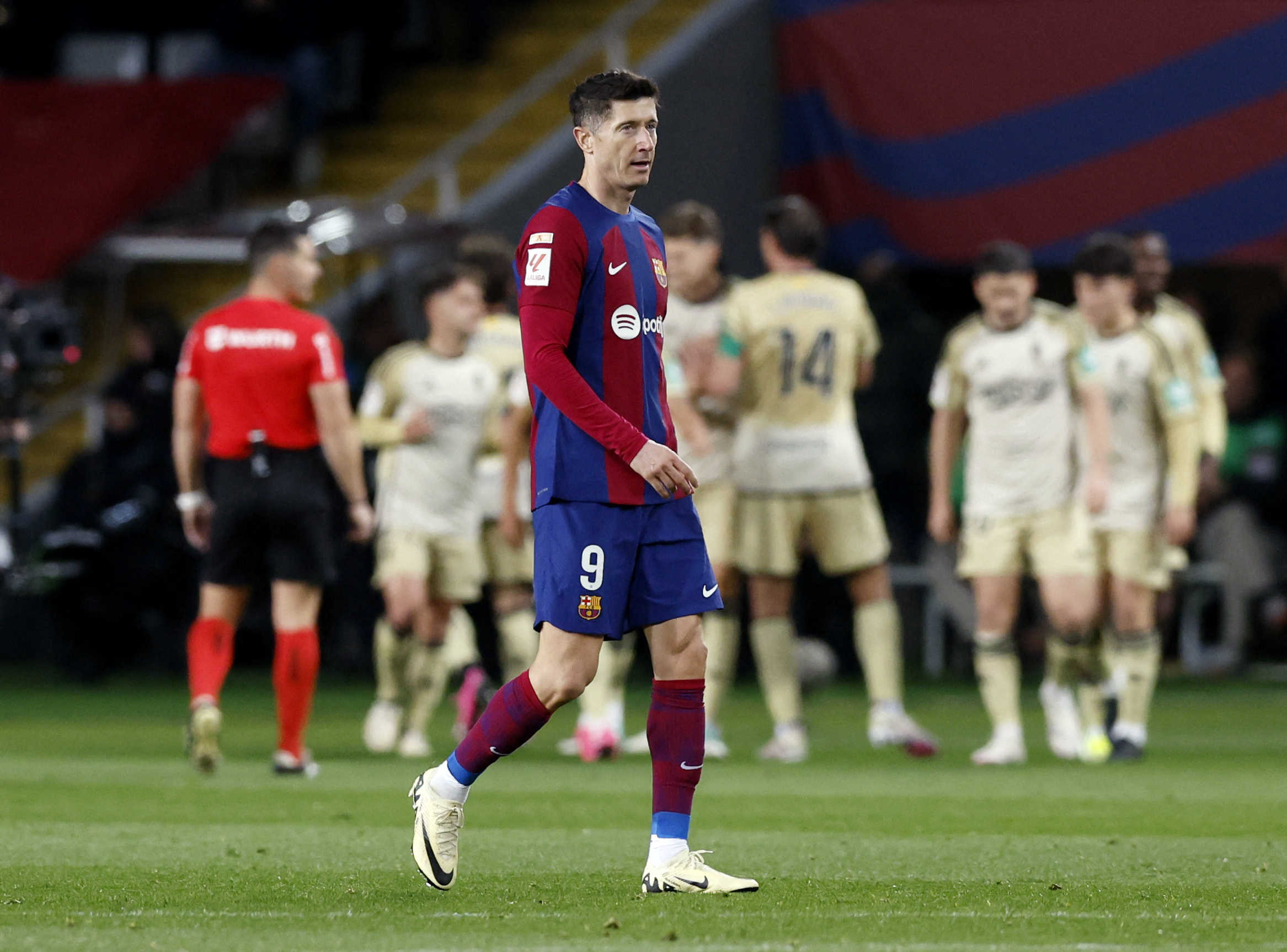 Soccer Football - LaLiga - FC Barcelona v Granada - Estadi Olimpic Lluis Companys, Barcelona, Spain - February 11, 2024 FC Barcelona's Robert Lewandowski looks dejected after Granada's Ricard Sanchez scores their first goal REUTERS