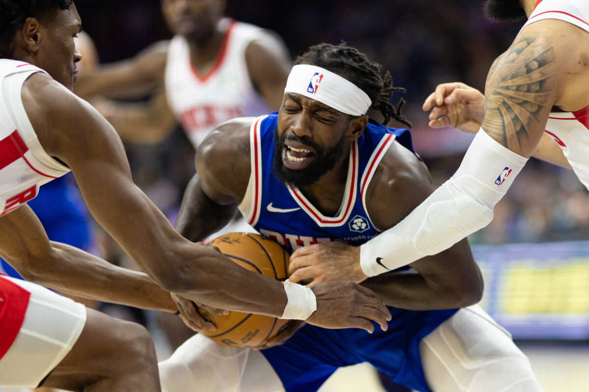 Jan 15, 2024; Philadelphia, Pennsylvania, USA; Philadelphia 76ers guard Patrick Beverley (22) wrestles for ball control against the Houston Rockets during the first quarter at Wells Fargo Center. Mandatory Credit: Bill Streicher-USA TODAY Sports