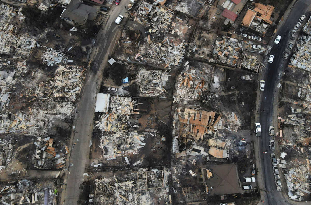 An areal view shows the burnt remains of houses following the spread of wildfires, in Vina del Mar, Chile February 4, 2024. REUTERS