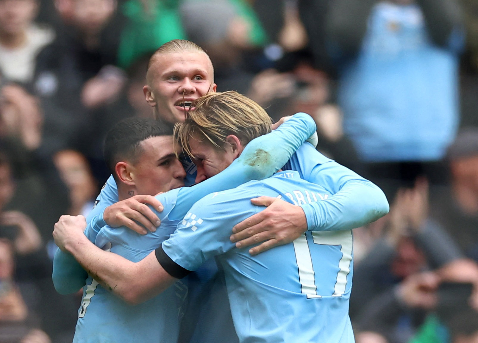 Soccer Football - Premier League - Manchester City v Everton - Etihad Stadium, Manchester, Britain - February 10, 2024 Manchester City's Erling Braut Haaland celebrates scoring their second goal with Phil Foden and Kevin De Bruyne REUTERS