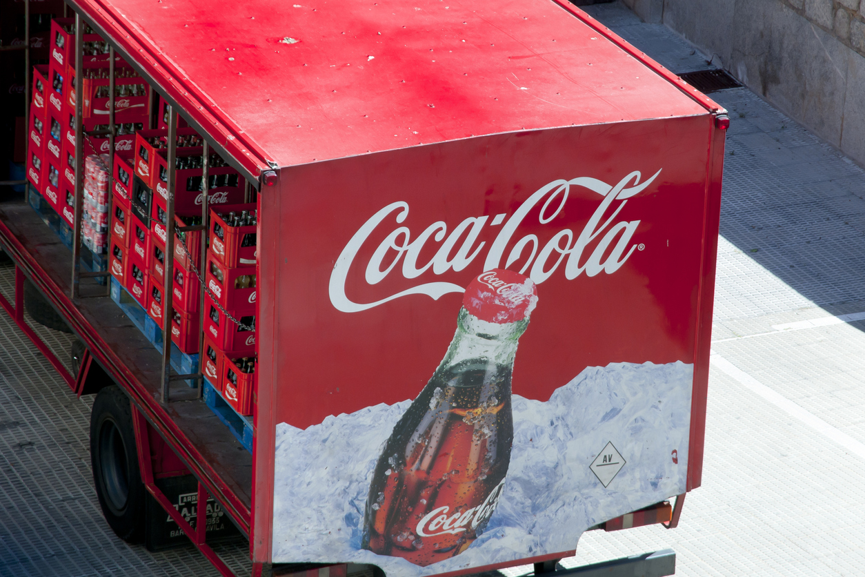 Avila, Spain - June 8, 2016: Coca Cola shipping truck making a delivery to a local bar restaurant