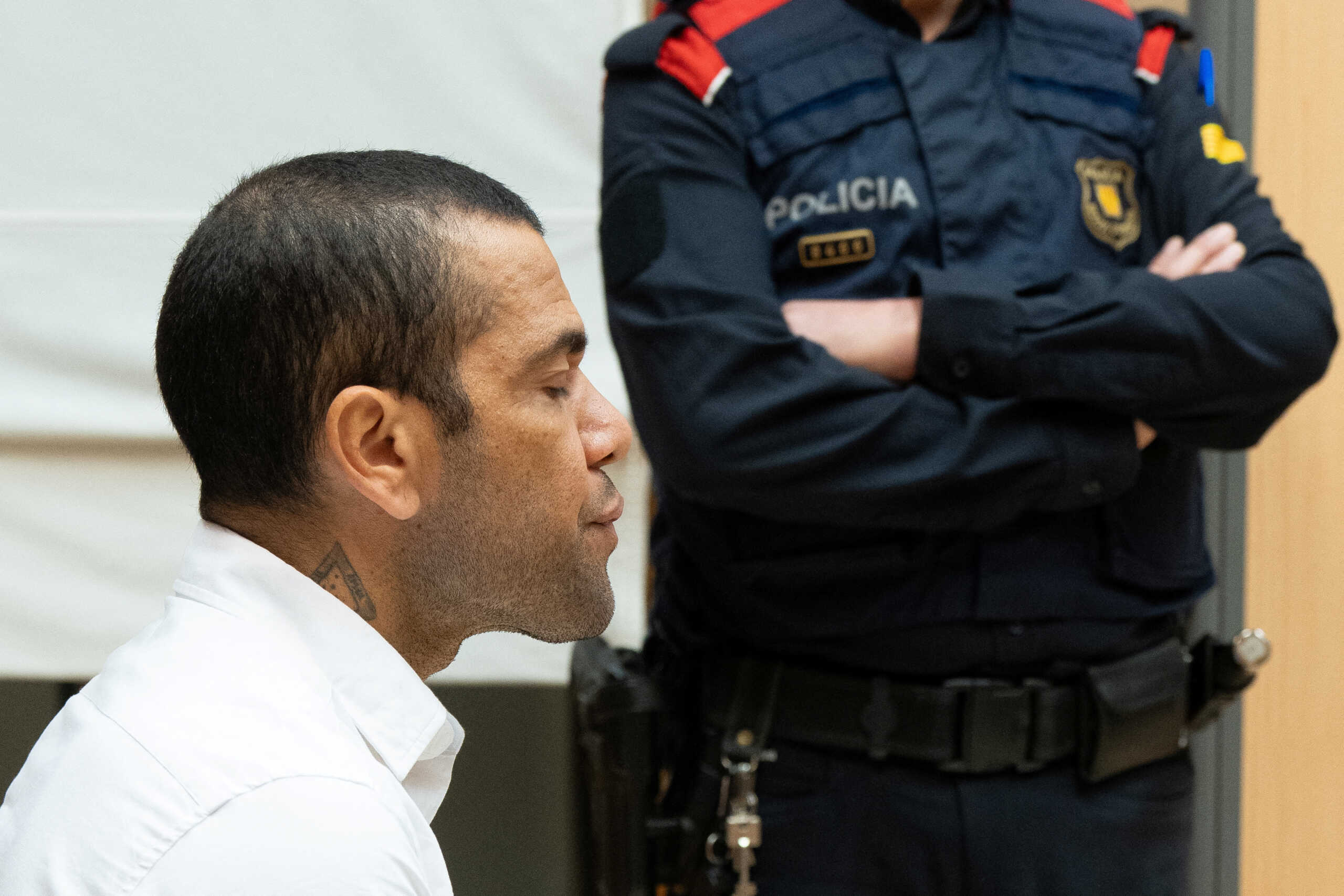 Brazil soccer player Dani Alves reacts as he sits in court during the first day of his trial in Barcelona, Spain, February 5, 2024. D.Zorrakino