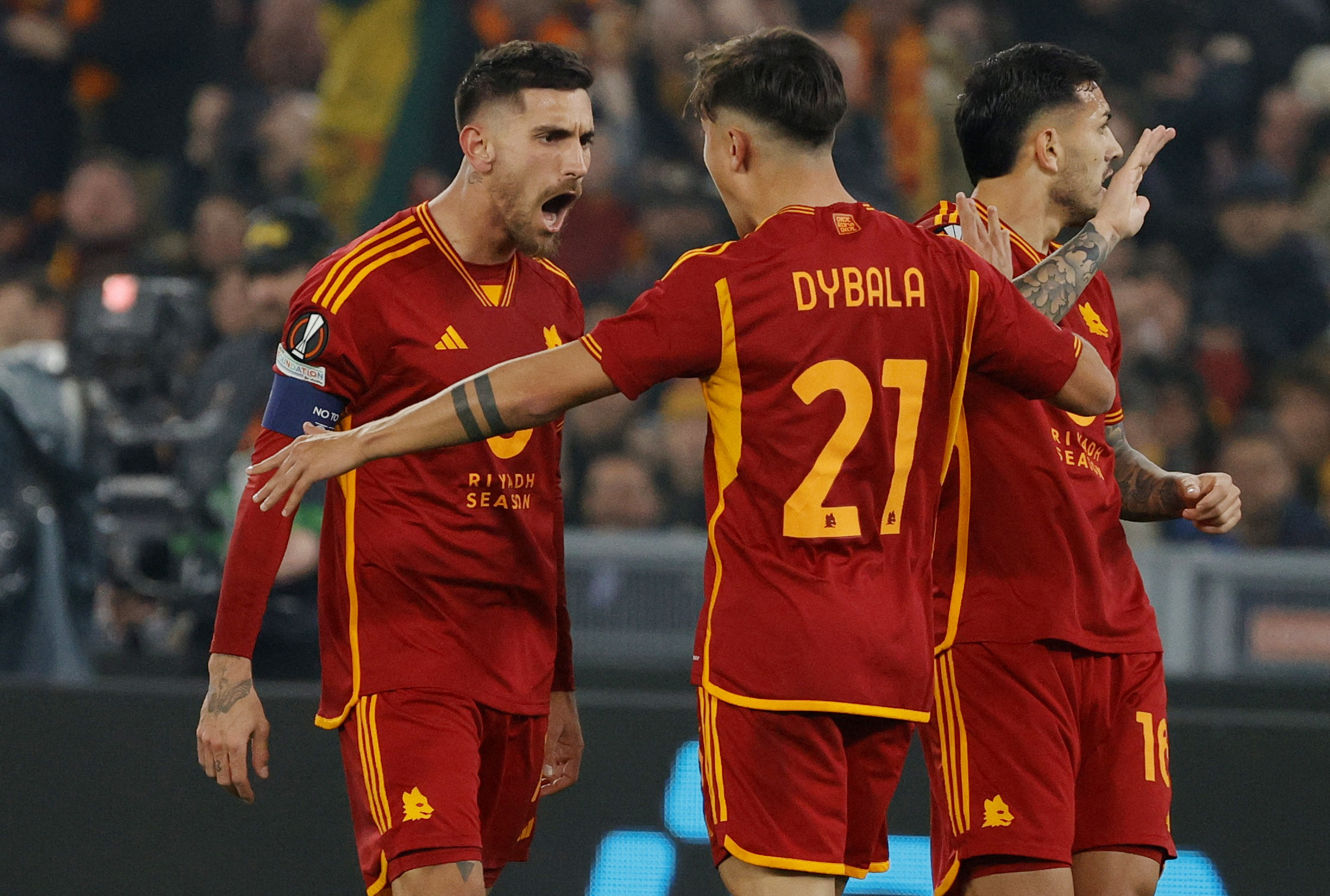 Soccer Football - Europa League - Play-Off - Second Leg - AS Roma v Feyenoord - Stadio Olimpico, Rome, Italy - February 22, 2024 AS Roma's Lorenzo Pellegrini celebrates scoring their first goal with Paulo Dybala REUTERS
