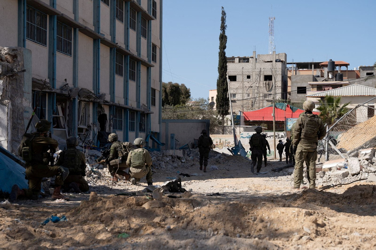 Israeli soldiers operate, amid the ongoing conflict between Israel and the Palestinian Islamist group Hamas, in a location given as Nasser Hospital in Gaza in this picture released on February 18, 2024.  Israel Defense Forces