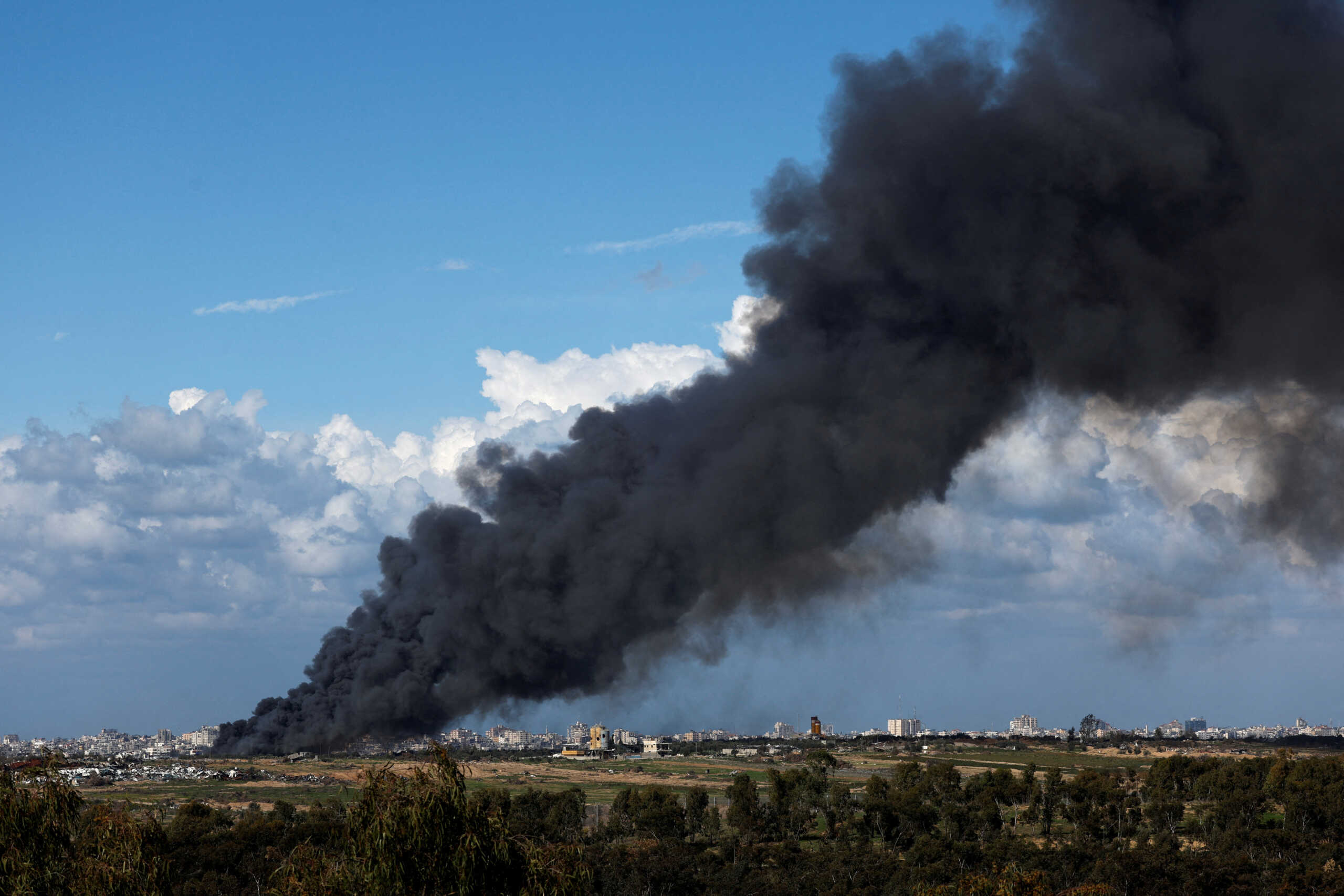 A smoke rises from the North Gaza, amid the ongoing conflict between Israel and the Palestinian Islamist group Hamas, as seen from Israel January 31, 2024. REUTERS