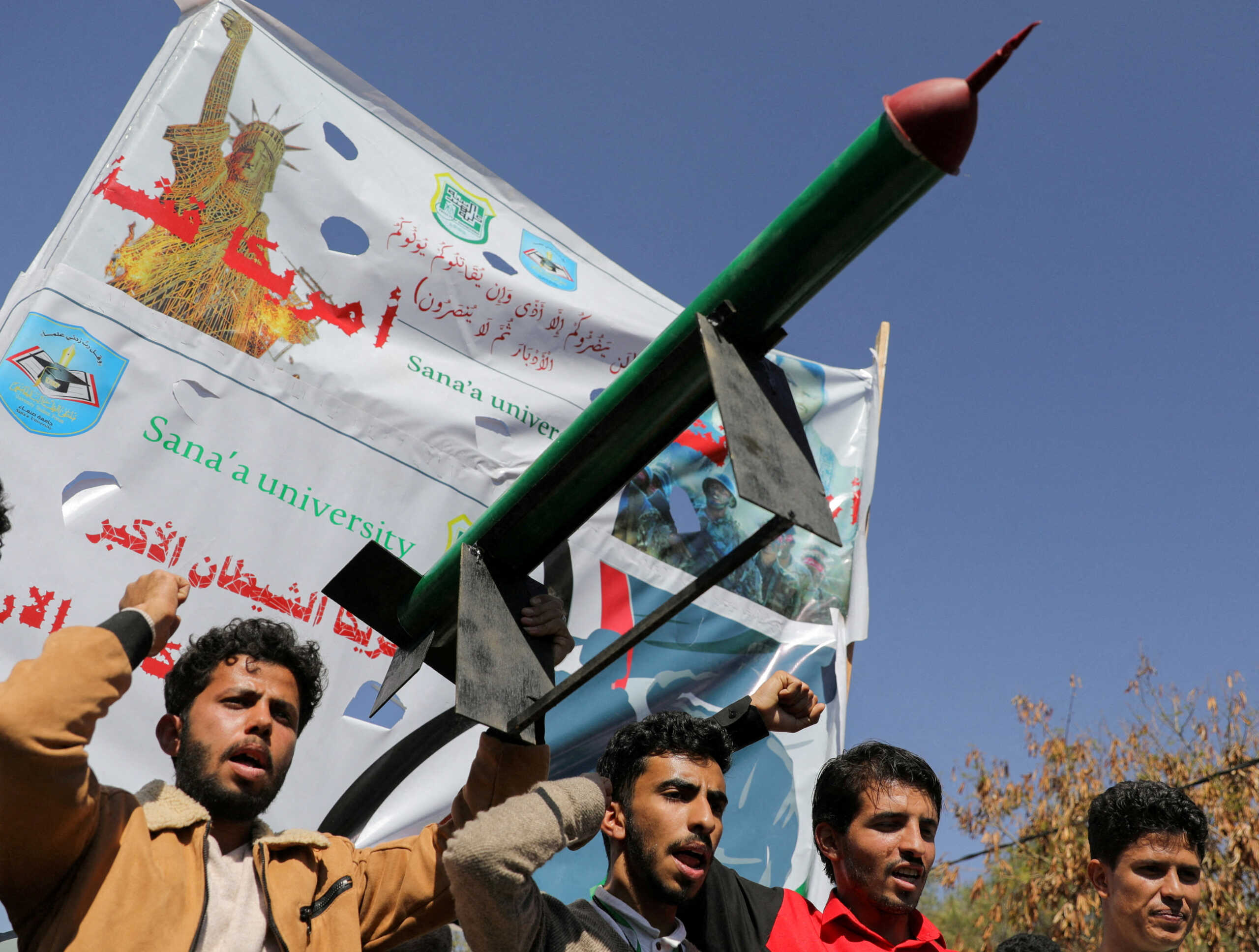 FILE PHOTO: A mock missile is carried by university students during a rally to show support for the Palestinians in the Gaza Strip and the recent Houthi strikes on ships in the Red Sea and the Gulf of Aden, in Sanaa, Yemen January 31, 2024. REUTERS