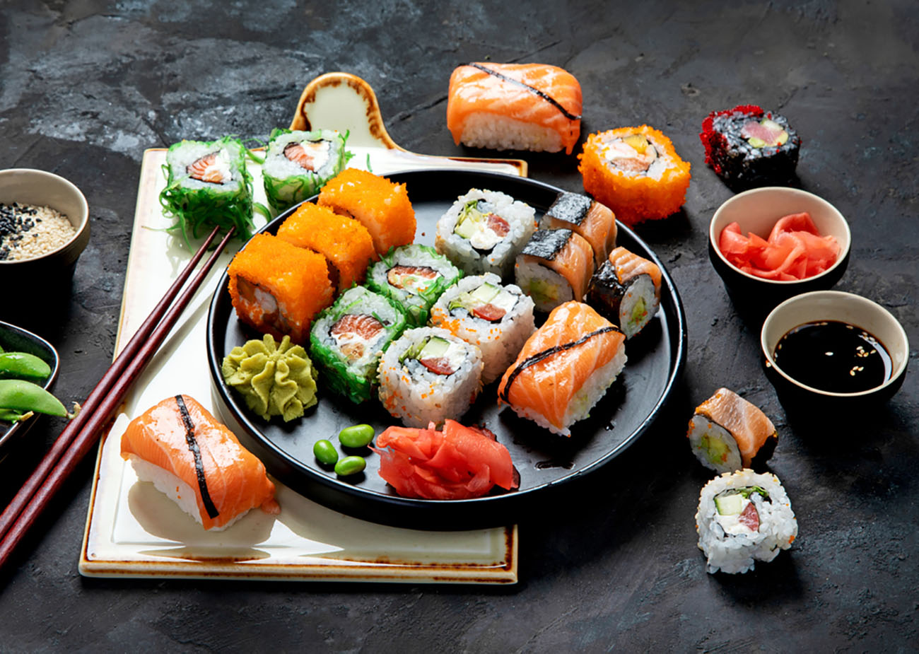 Sushi assortment on dark background. Japanese traditional luxury meal.