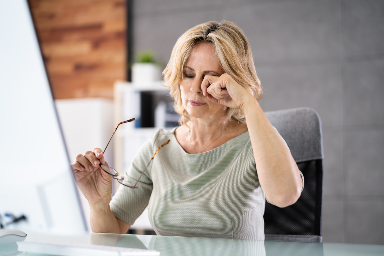 Woman Eye Fatigue And Pain. Tired Working On PC