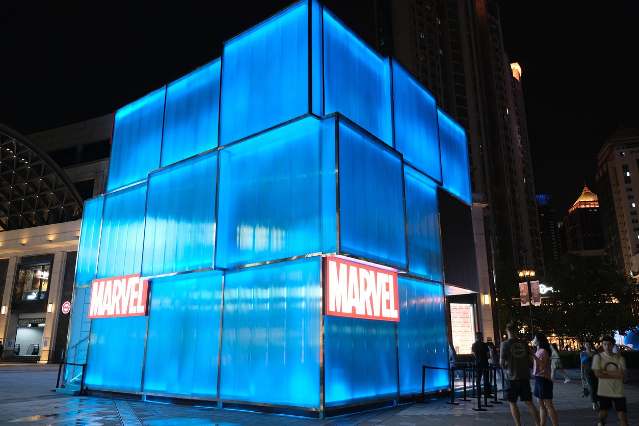 Shanghai,China-August 20th 2022: Marvel's toy pop-up shop and customers at night. Marvel brand logo on exterior of store.
