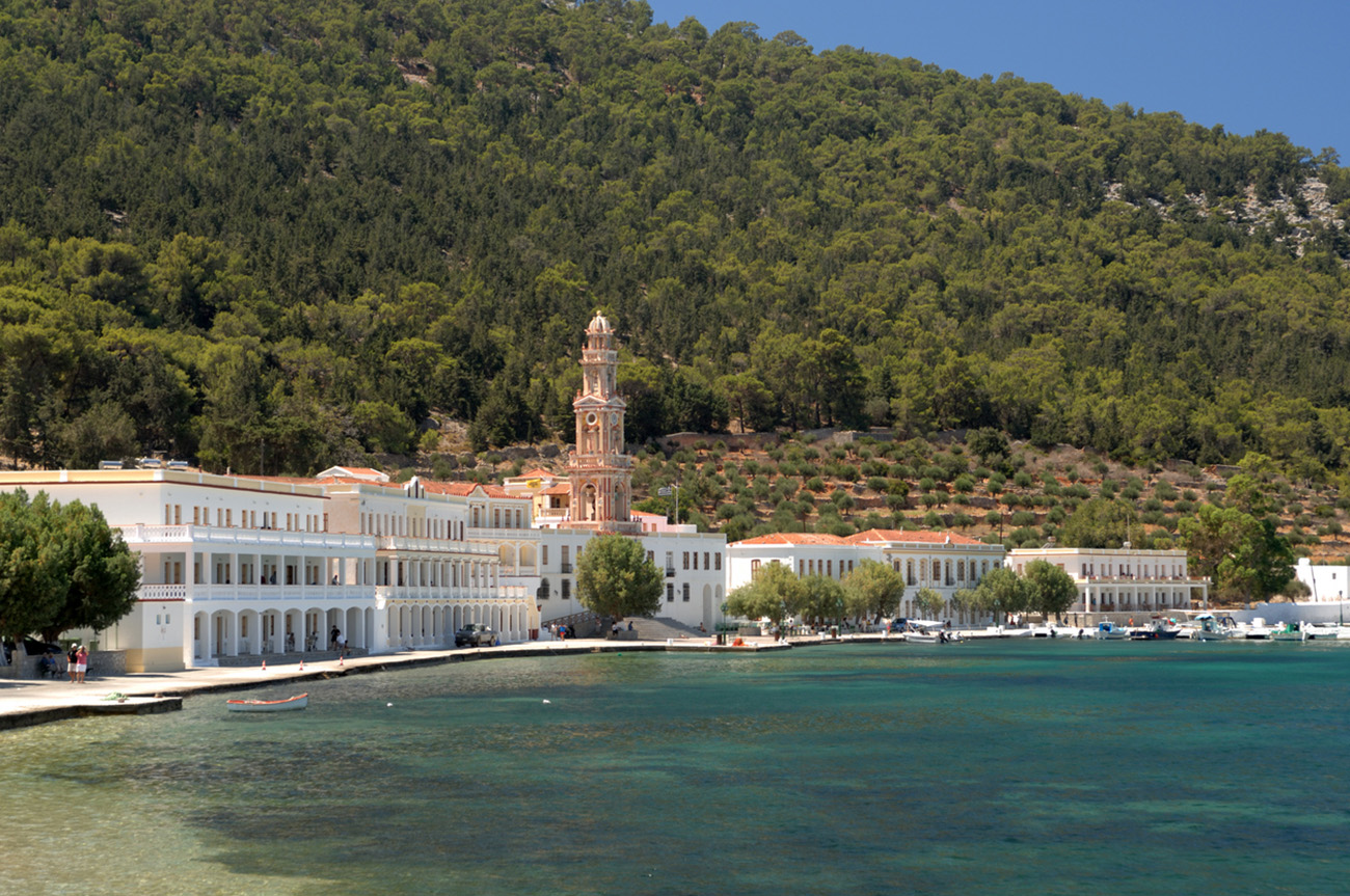 "Symi Island Greece, Panormitis monastery, famous throughout the dodecanese islands, the saint who is the protector of the sea men of the island. The picturesque bay is very popular yachting destination, and many day-cruise ferries pass by every day throughout the summer from Rhodes Island and Symi village.Nikon D2X, Nikkor 17-55mm, Polarizer filter, July 2010"